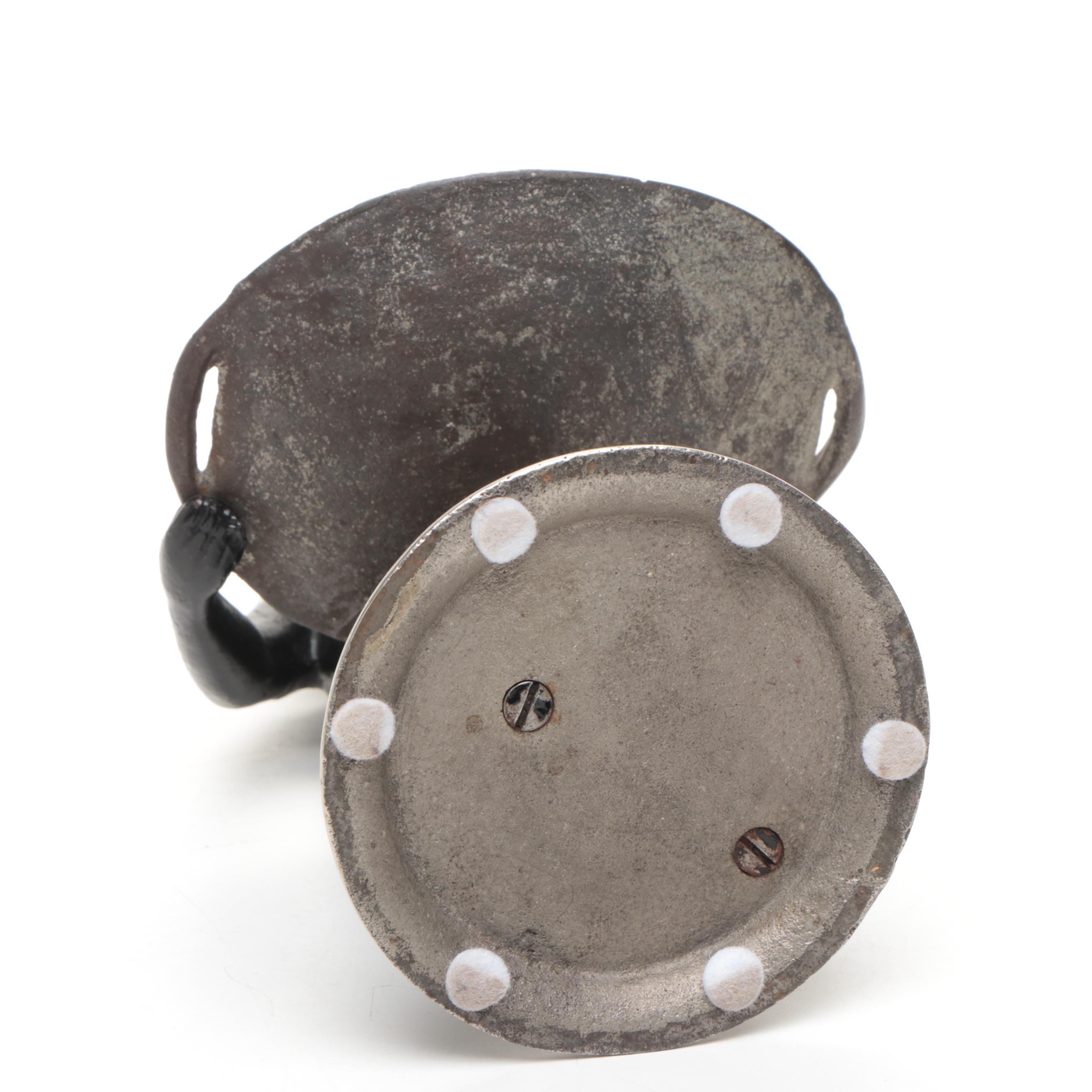 Metal Blackamoor Figure of Man Holding Woven Basket