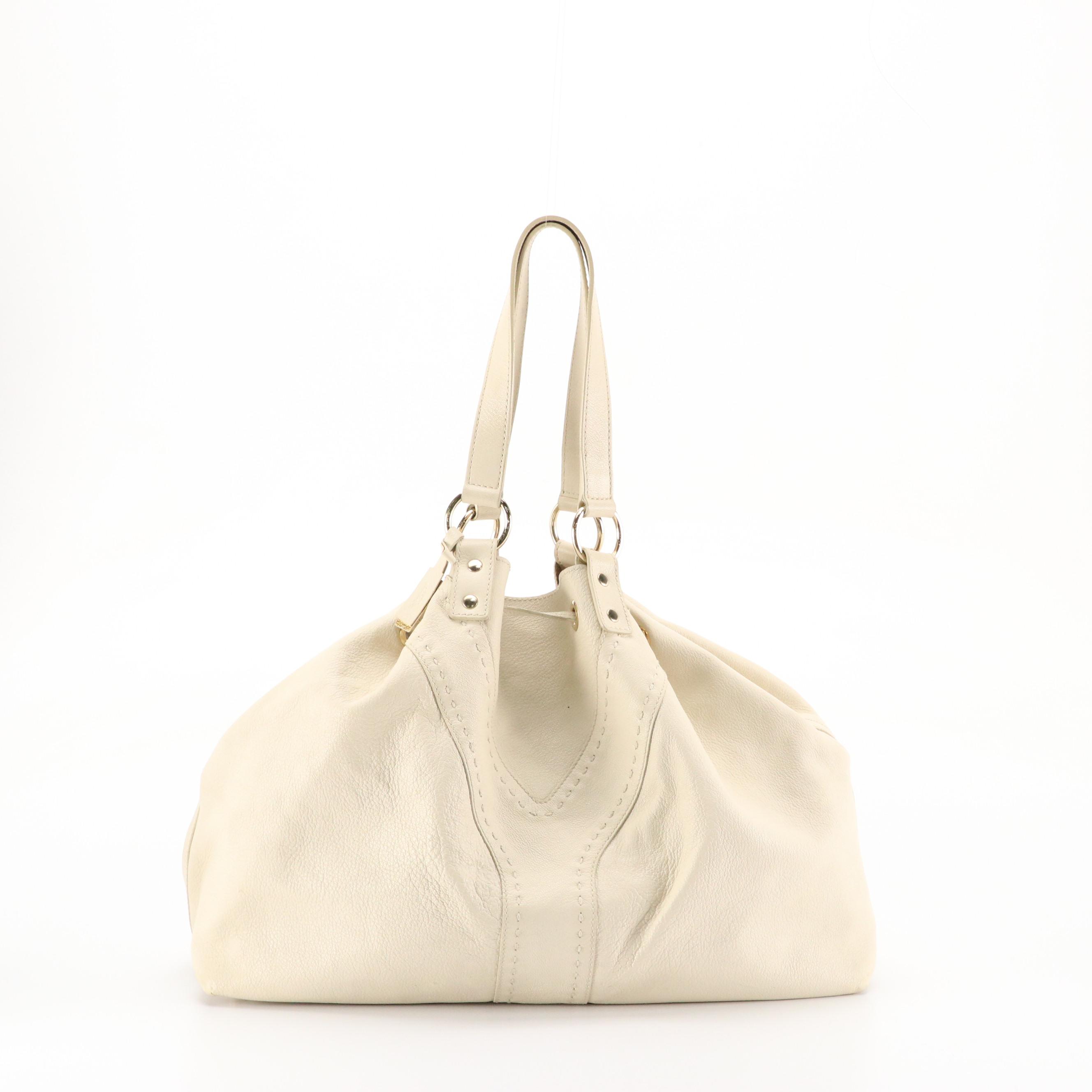 Yves Saint Laurent Reversible Drawstring Y Tote in Ivory/Metallic Gold Leather