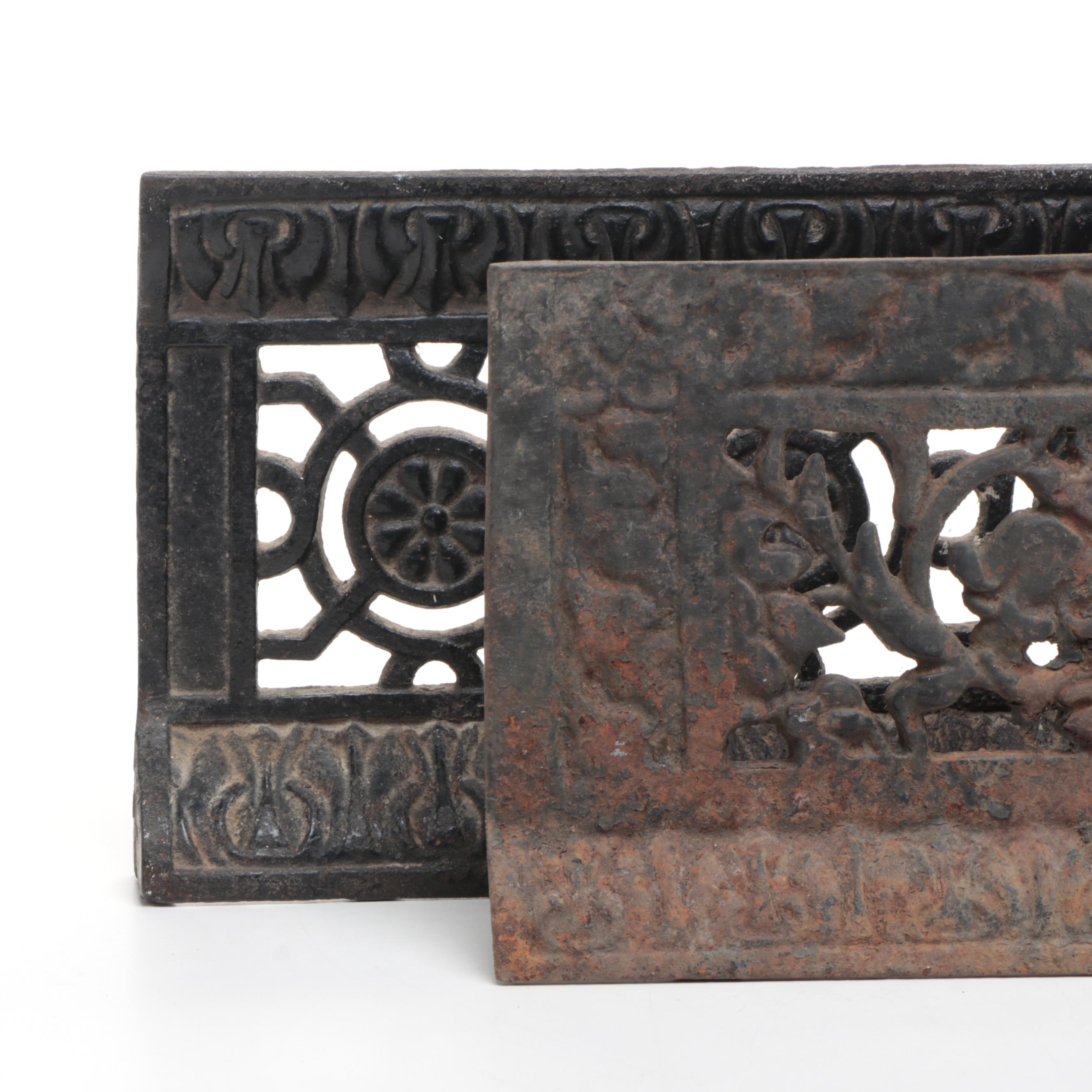 Two Cast Iron Grate Covers