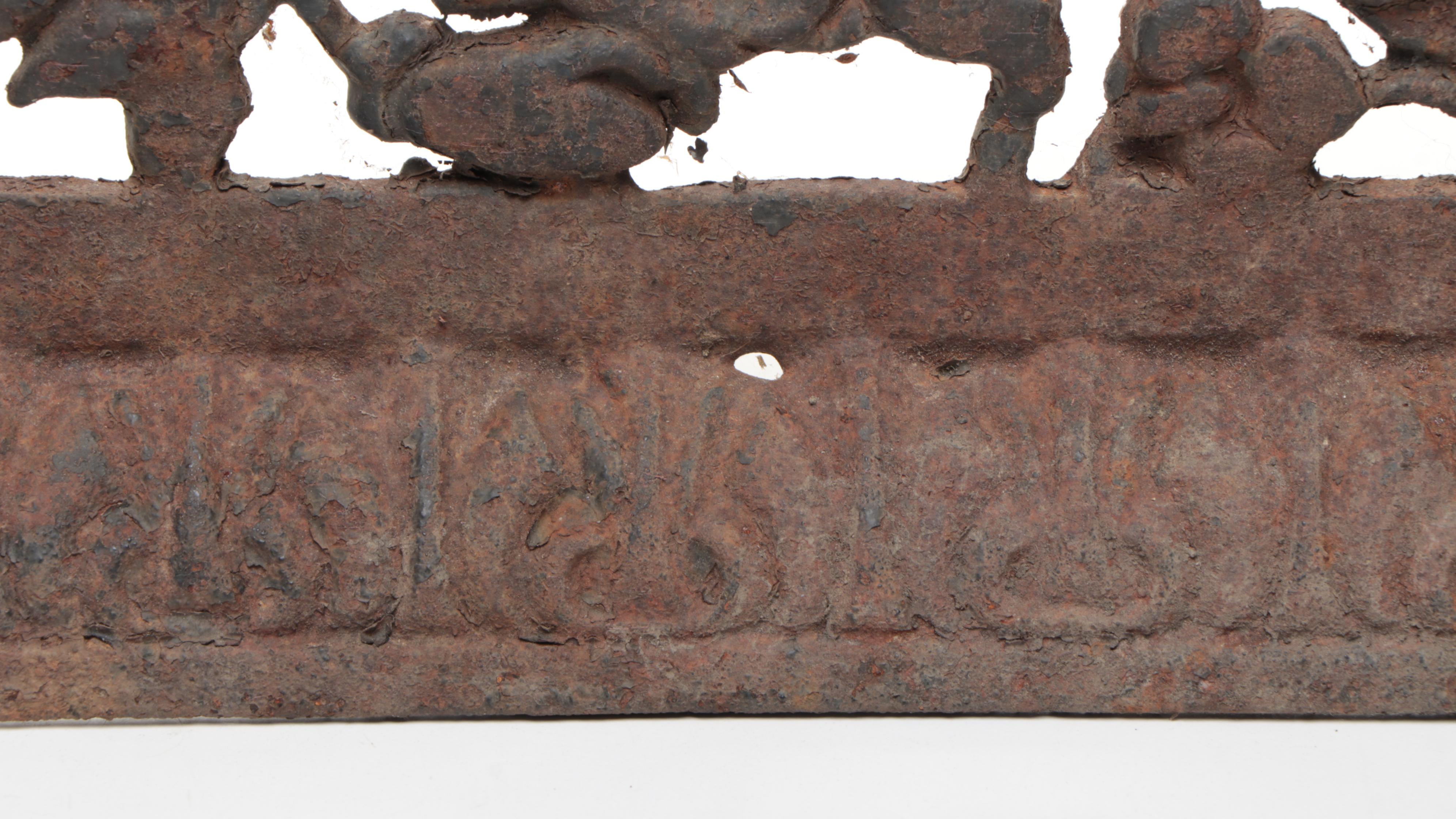 Two Cast Iron Grate Covers