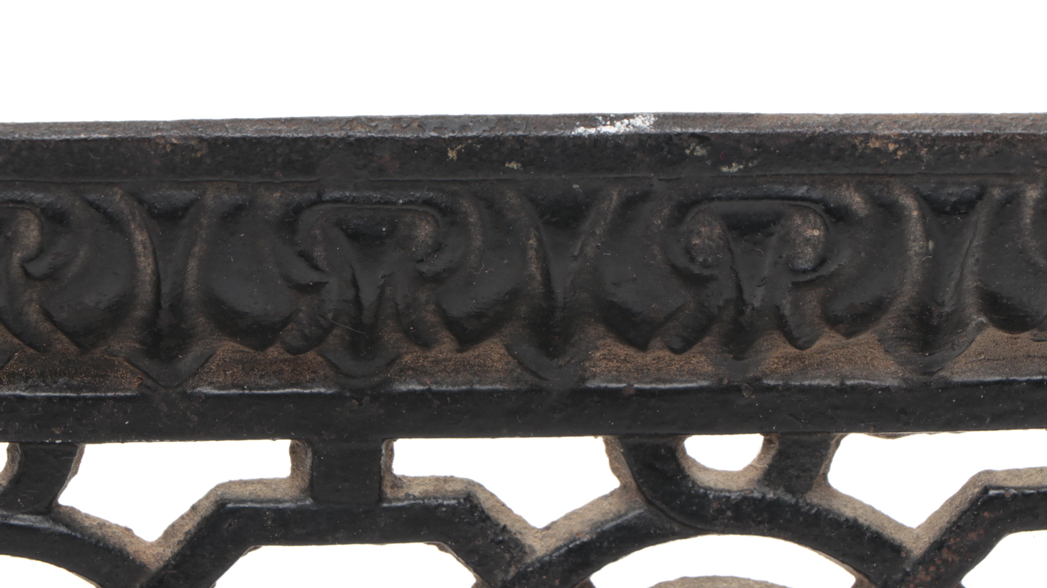 Two Cast Iron Grate Covers
