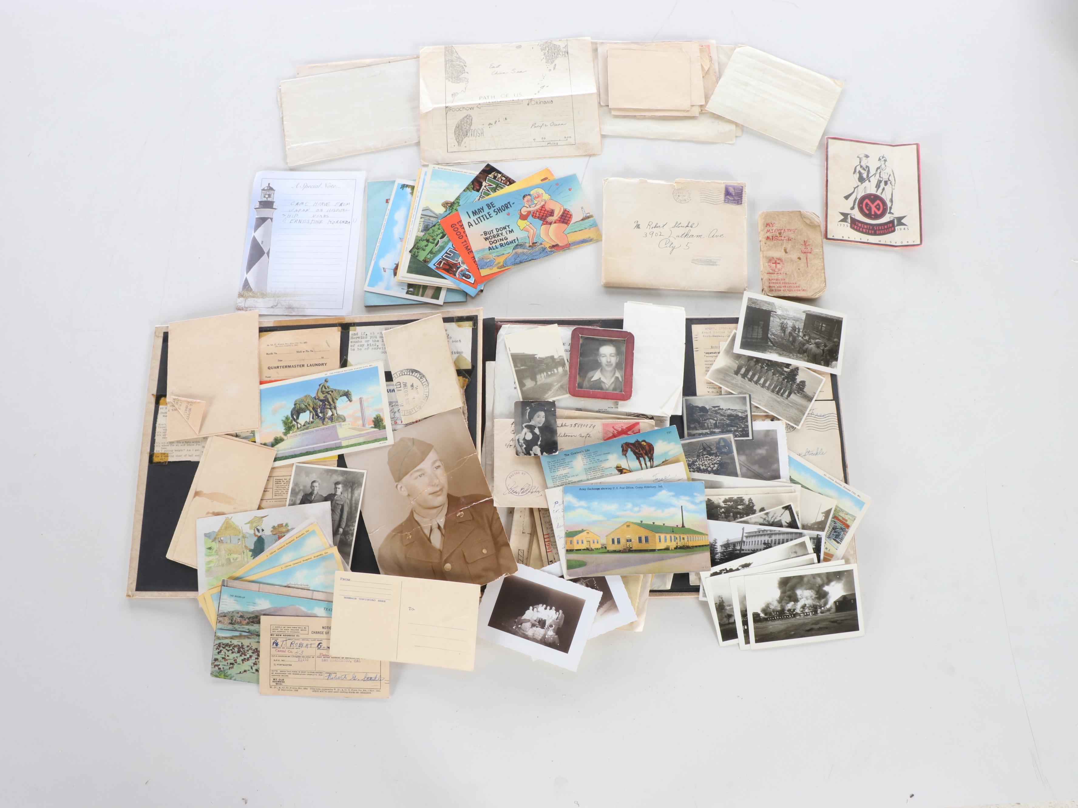 World War II Era Memorabilia Featuring US Army Bags and Photos inside Wood Trunk