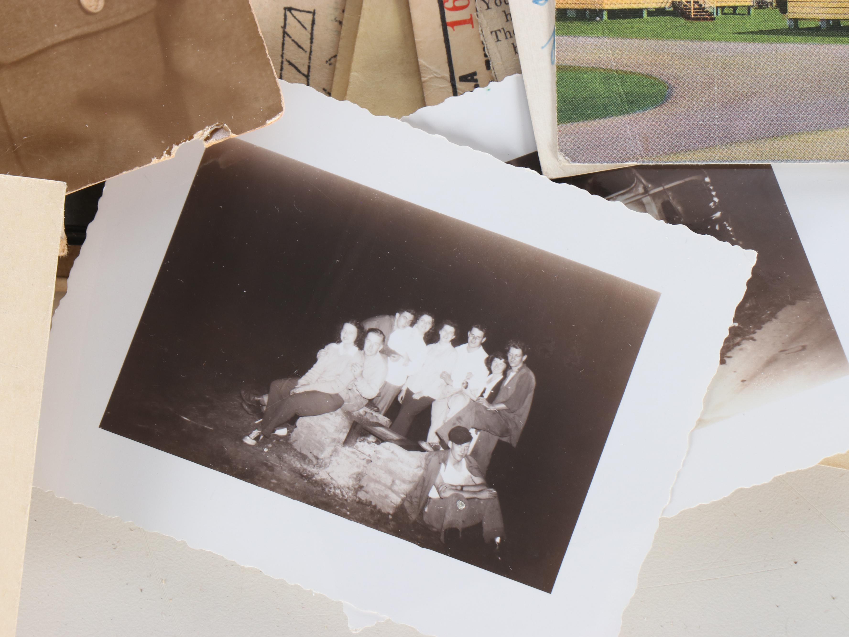 World War II Era Memorabilia Featuring US Army Bags and Photos inside Wood Trunk