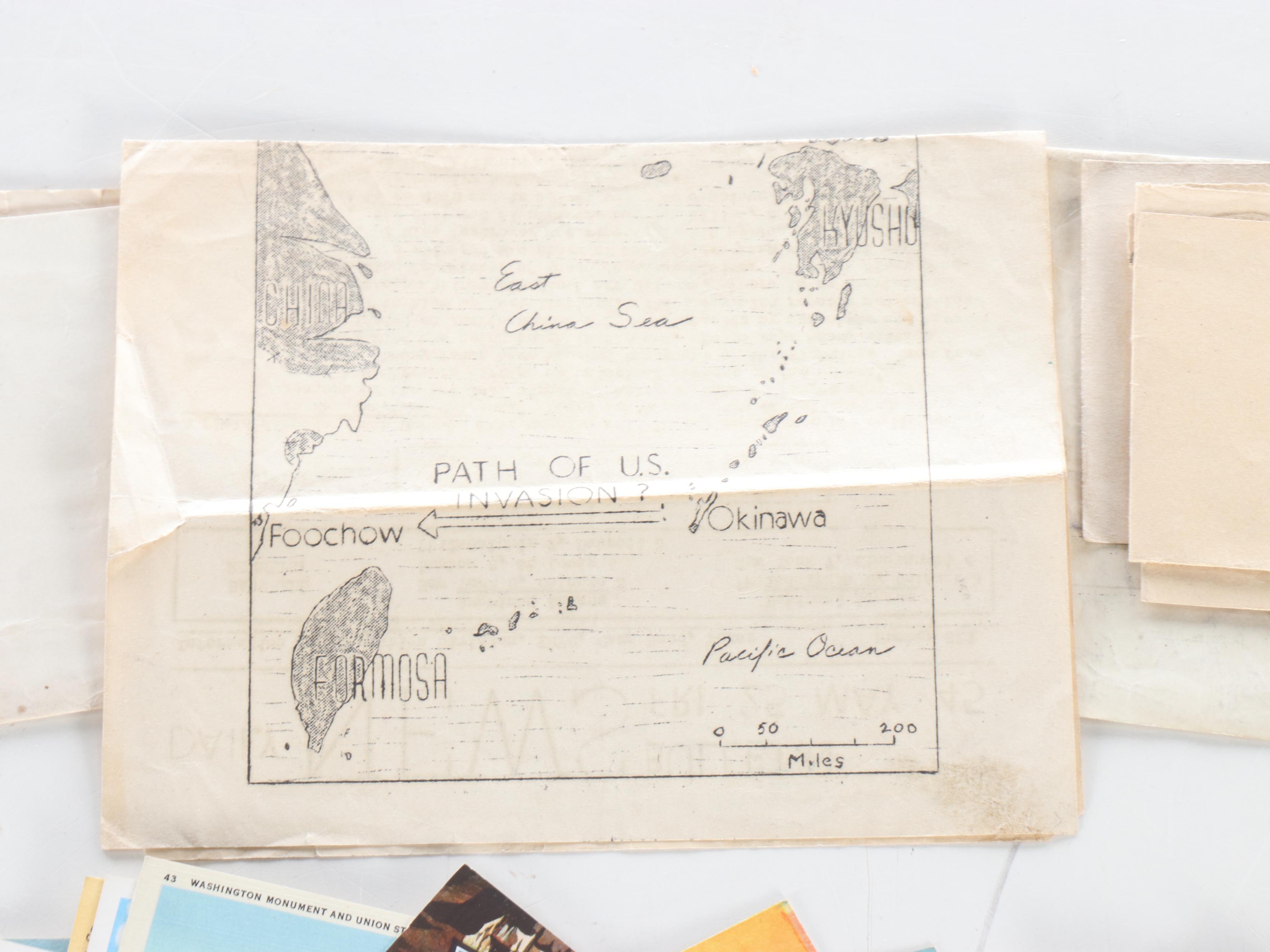 World War II Era Memorabilia Featuring US Army Bags and Photos inside Wood Trunk