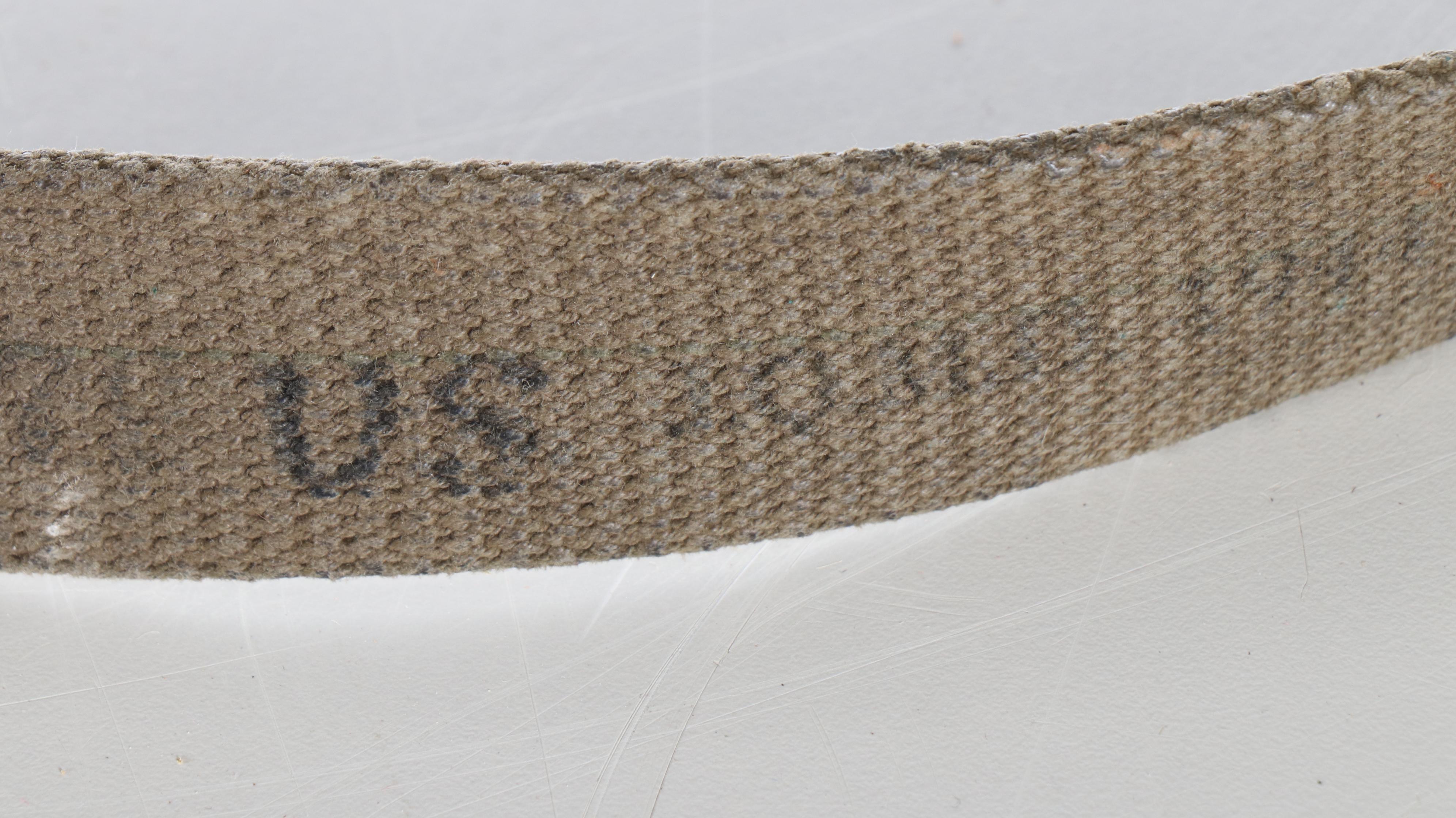 World War II Era Memorabilia Featuring US Army Bags and Photos inside Wood Trunk