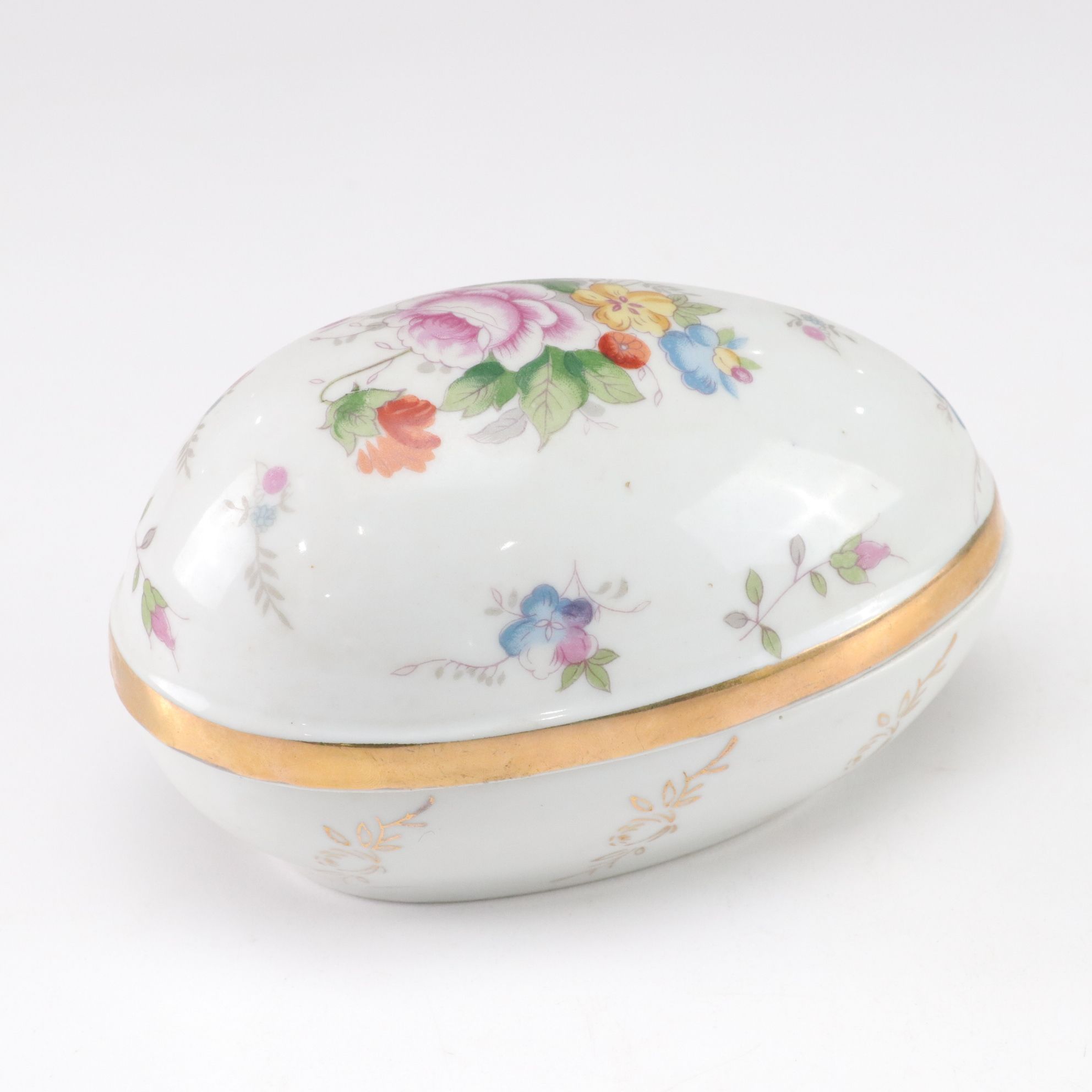 Ceramic and Porcelain Eggs with Tin Souvenir Egg in Faberge Pattern