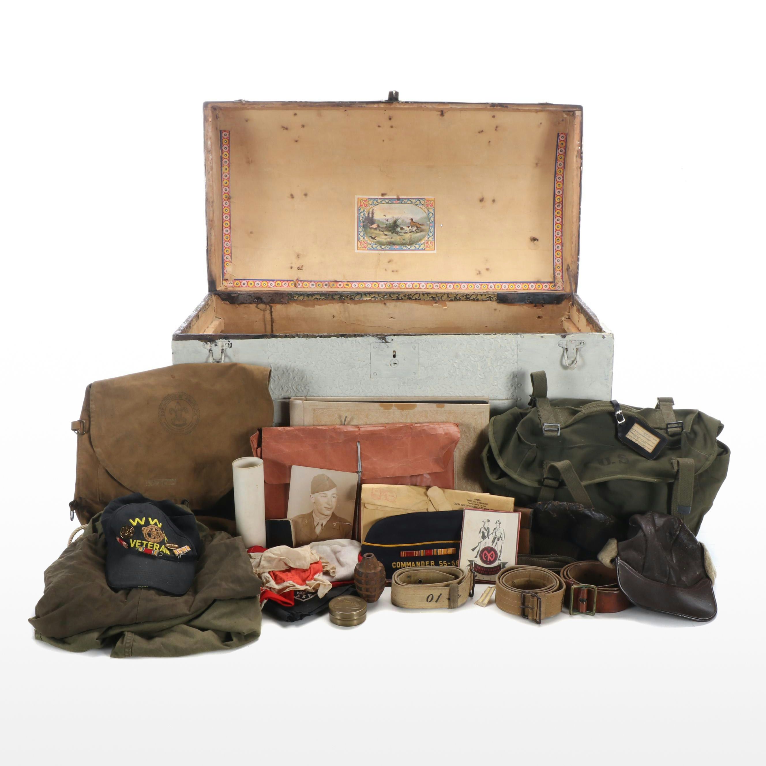 World War II Era Memorabilia Featuring US Army Bags and Photos inside Wood Trunk