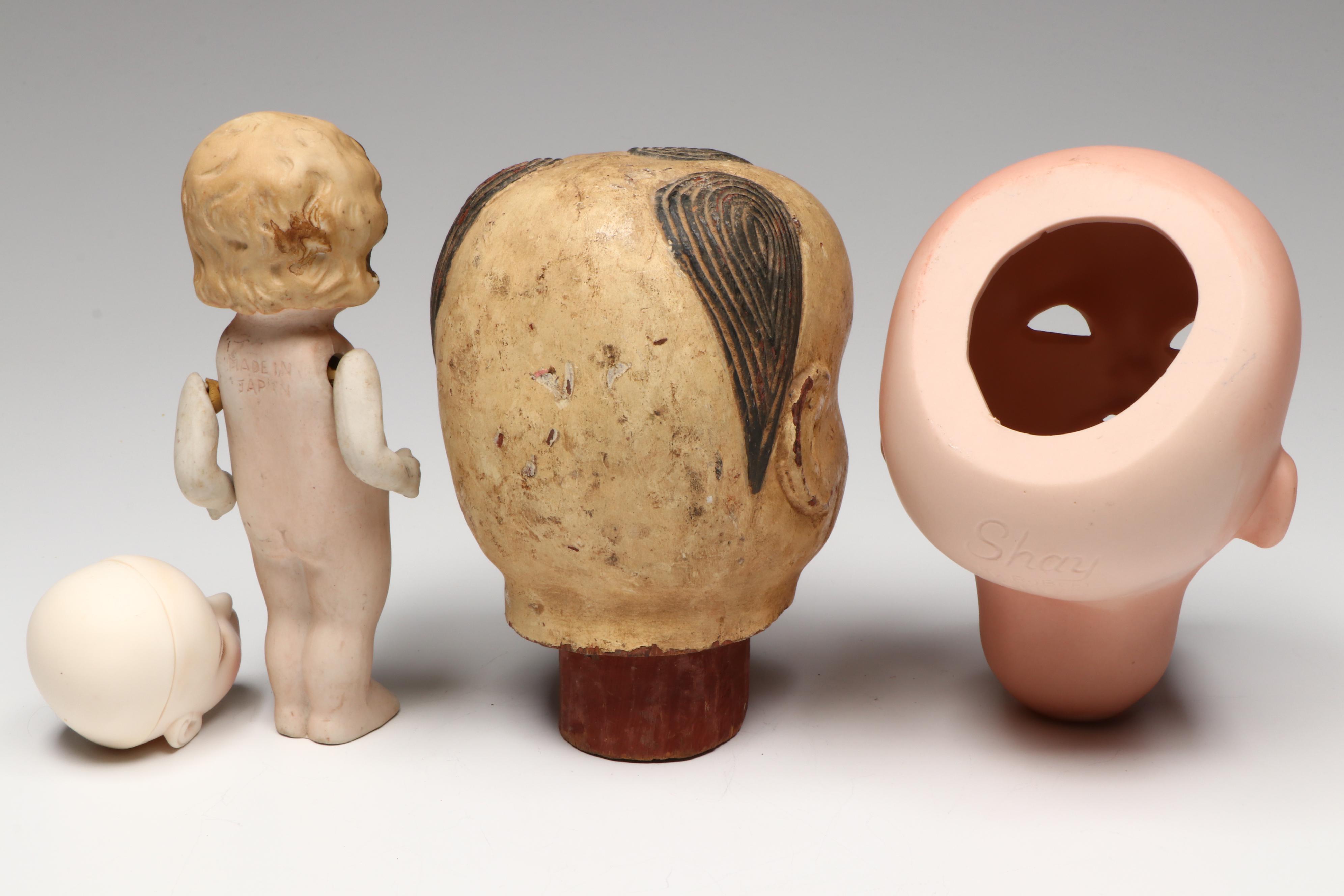 Japanese Polychrome Wood Gosho with Other Heads and All Bisque Googly Eye Doll