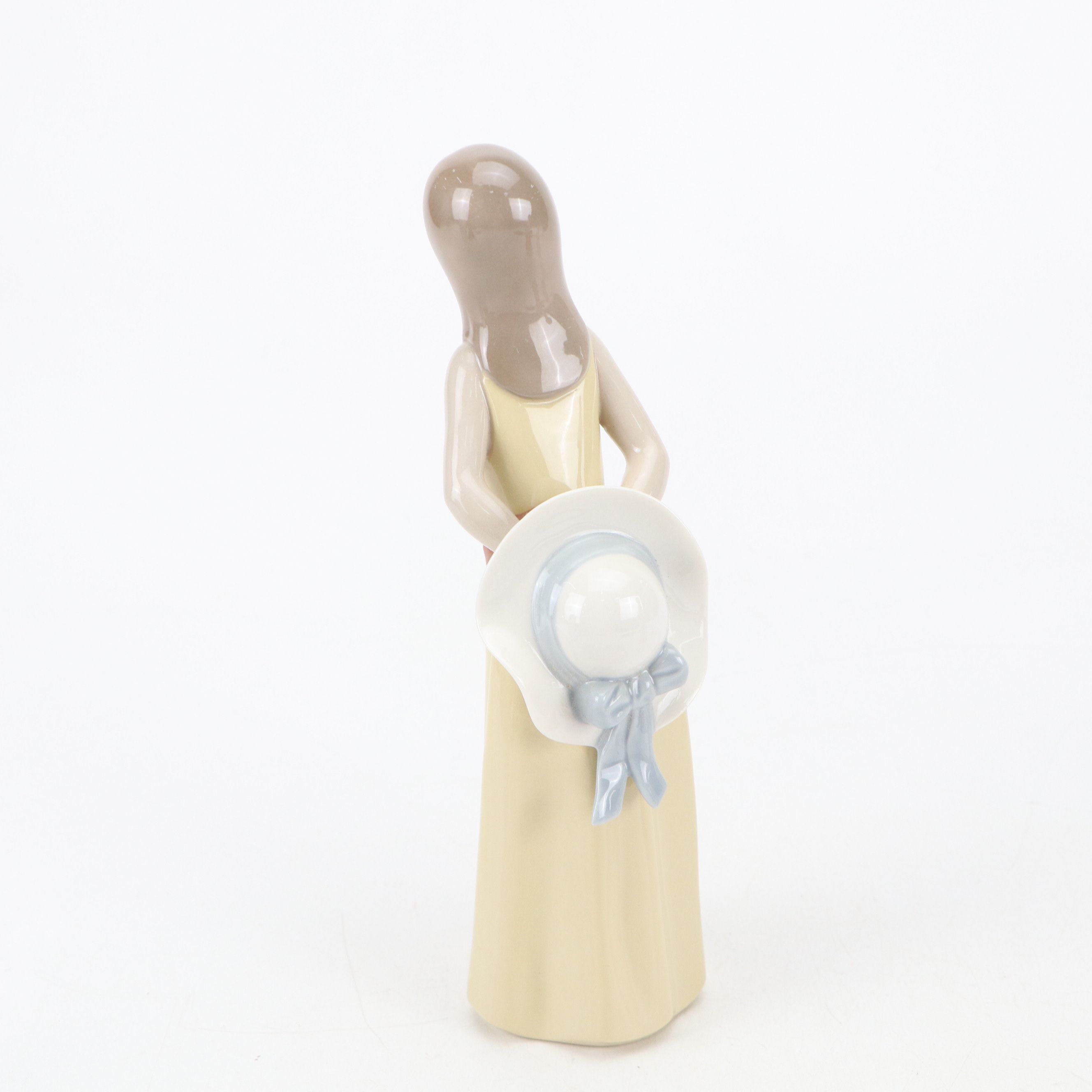 Lladró "Dreamer," "Naughty," and "Valencian Girl" Porcelain Figurines