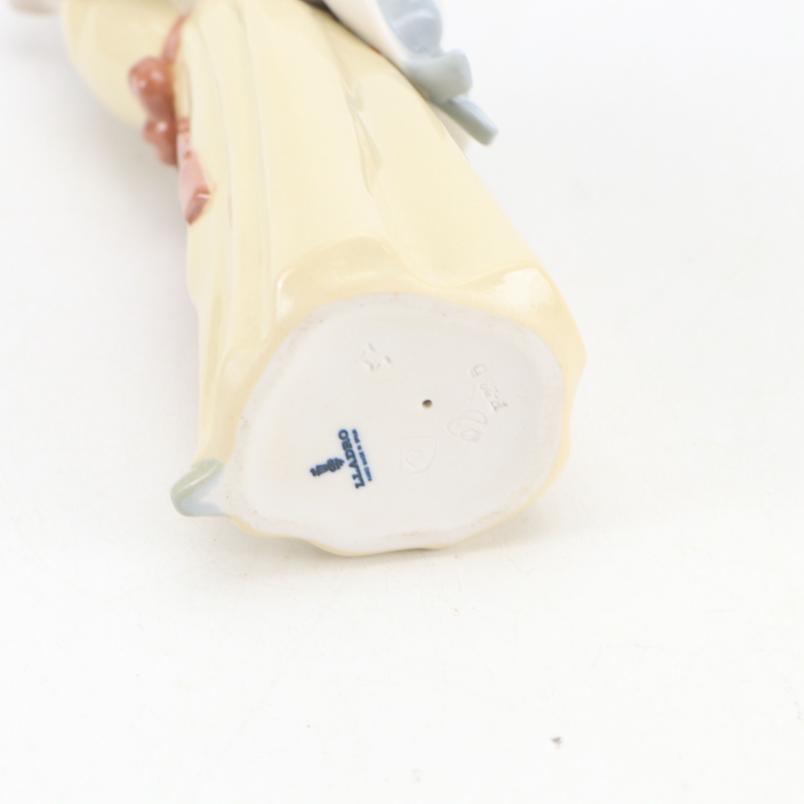 Lladró "Dreamer," "Naughty," and "Valencian Girl" Porcelain Figurines