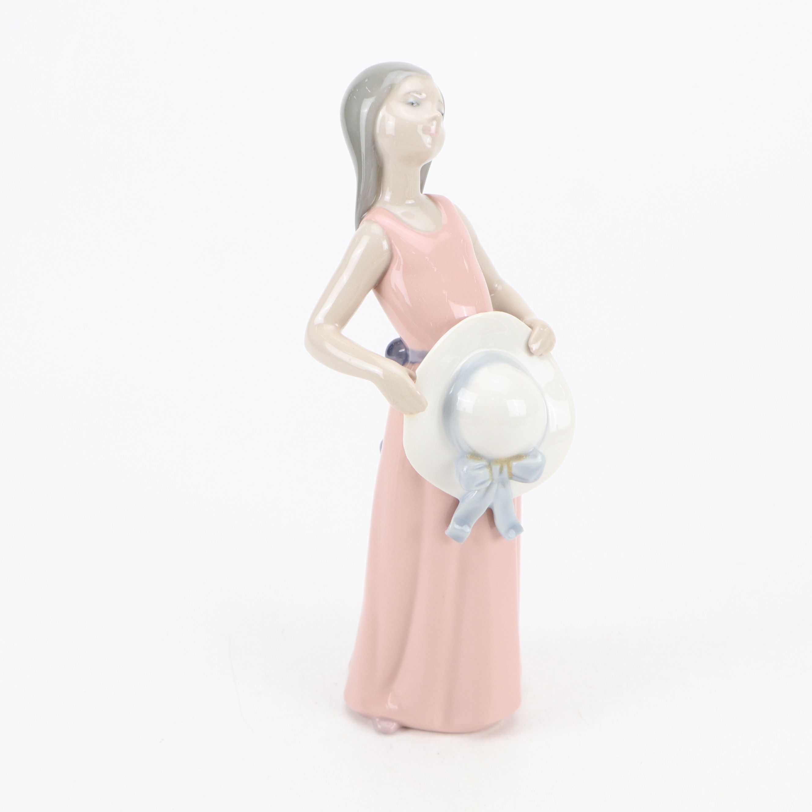 Lladró "Dreamer," "Naughty," and "Valencian Girl" Porcelain Figurines