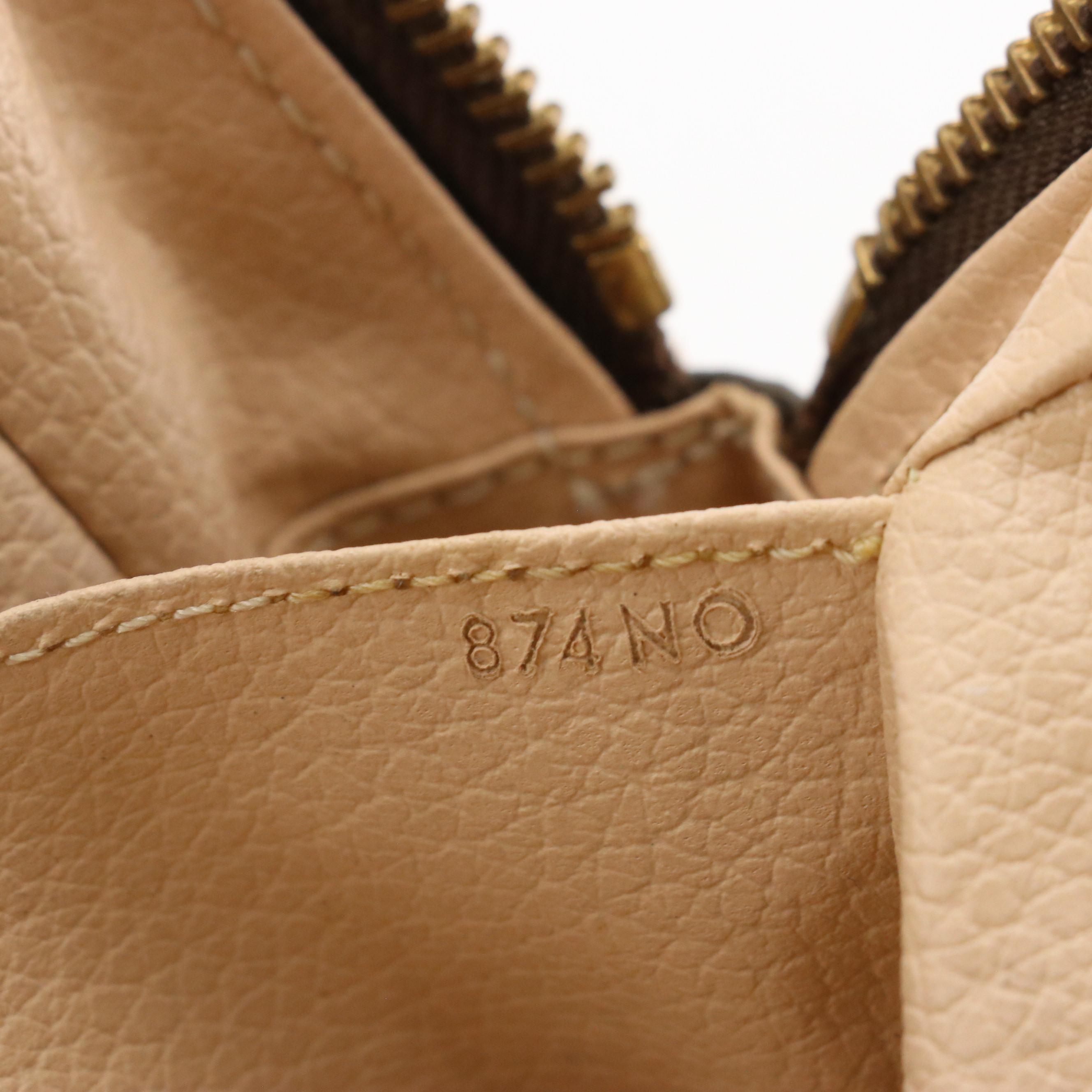 Louis Vuitton Trousse Toilette 28 Pouch in Monogram Coated Canvas