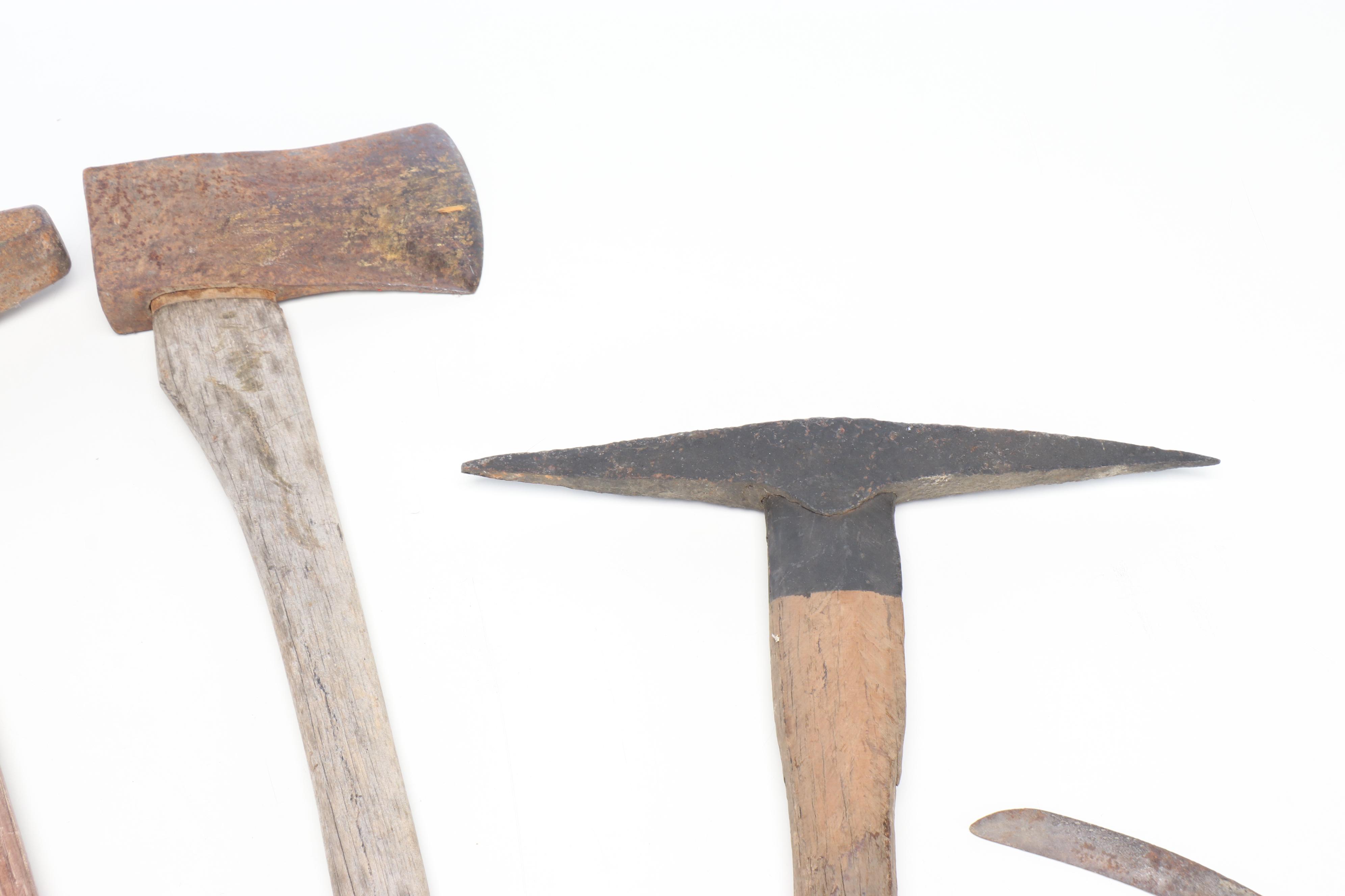 Vintage Scythe, Railroad Spike Driver, Axe, and Other Hand Tools