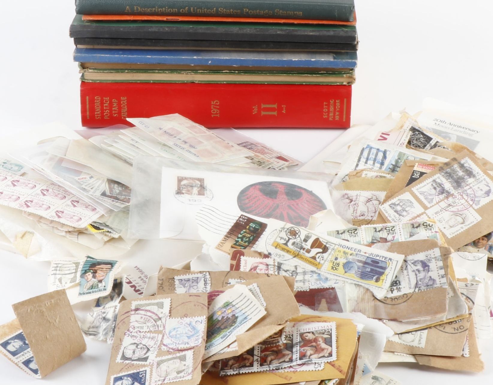 Collection of Used and Unused U.S. and World Stamps With Six Old Stamp Albums