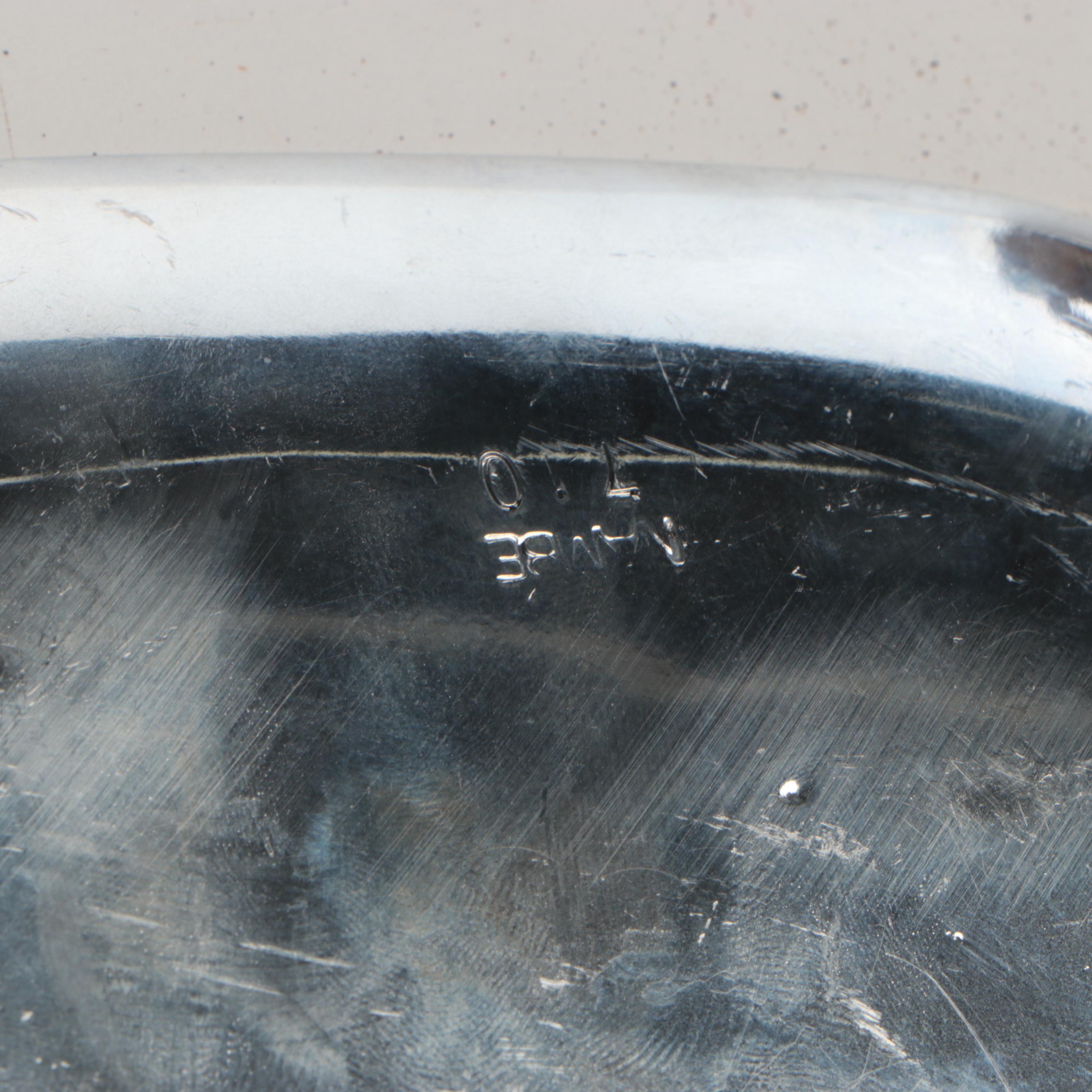 Wicker Tray with Nambé Metal Tray and Plates and Other Wood Cutting Boards