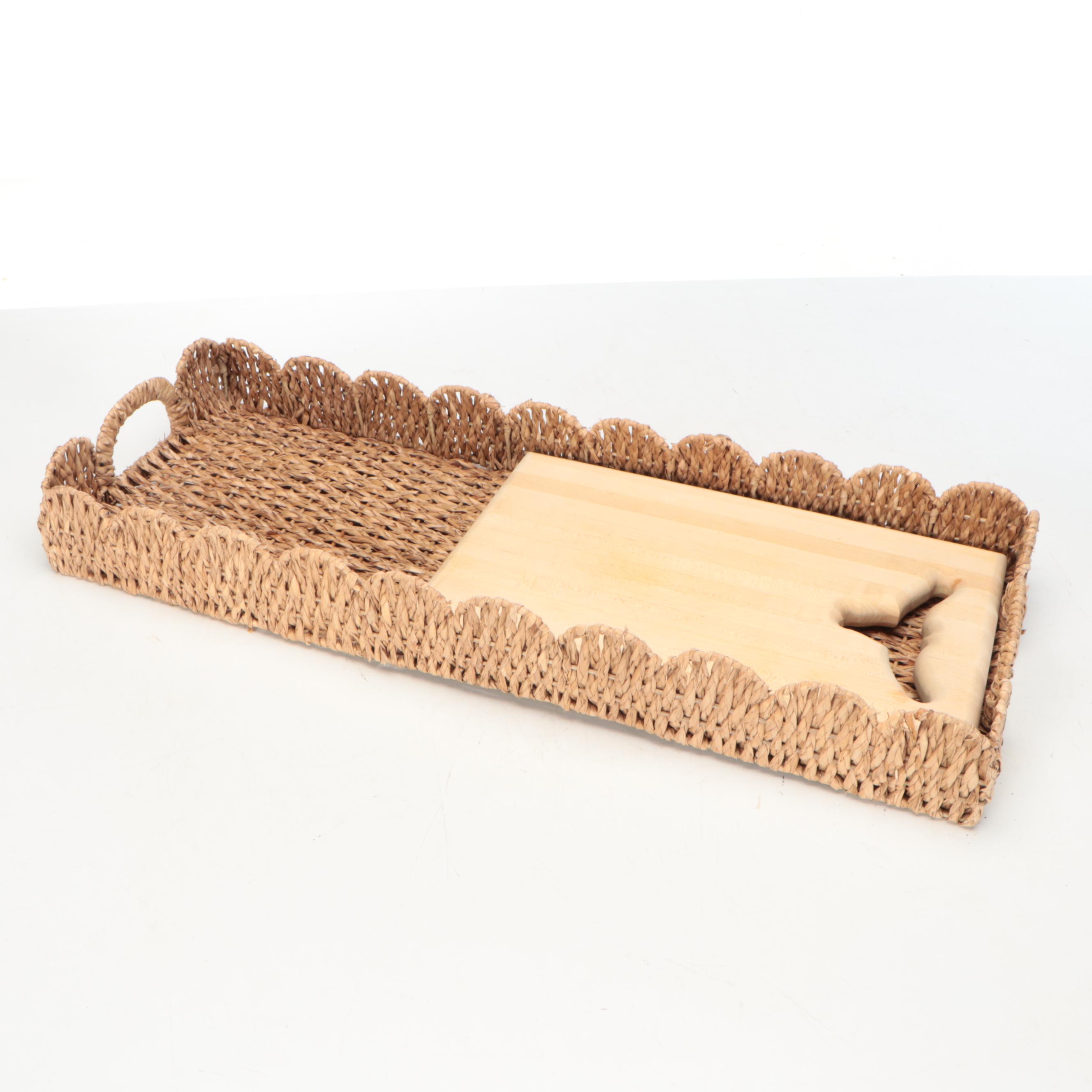 Wicker Tray with Nambé Metal Tray and Plates and Other Wood Cutting Boards