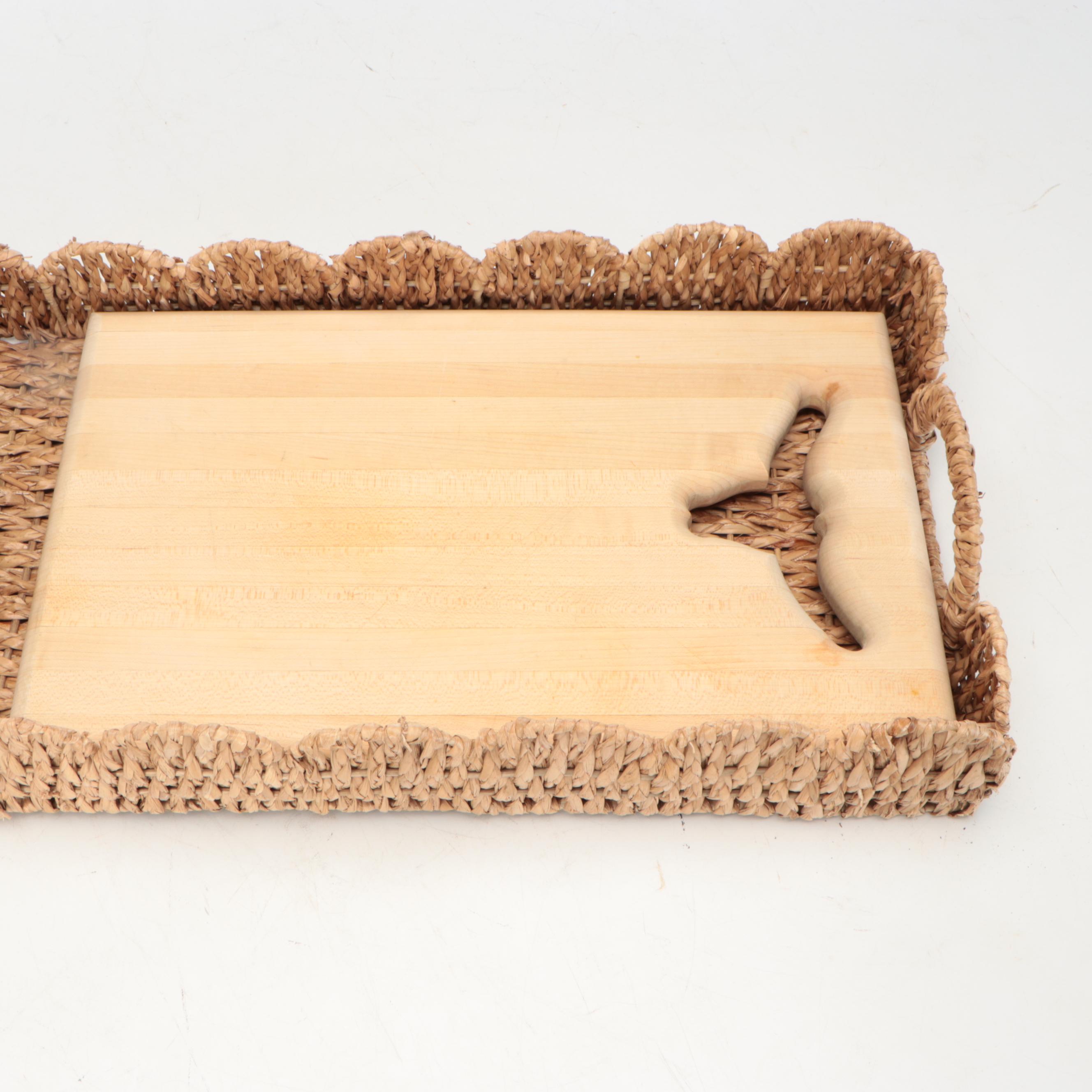 Wicker Tray with Nambé Metal Tray and Plates and Other Wood Cutting Boards