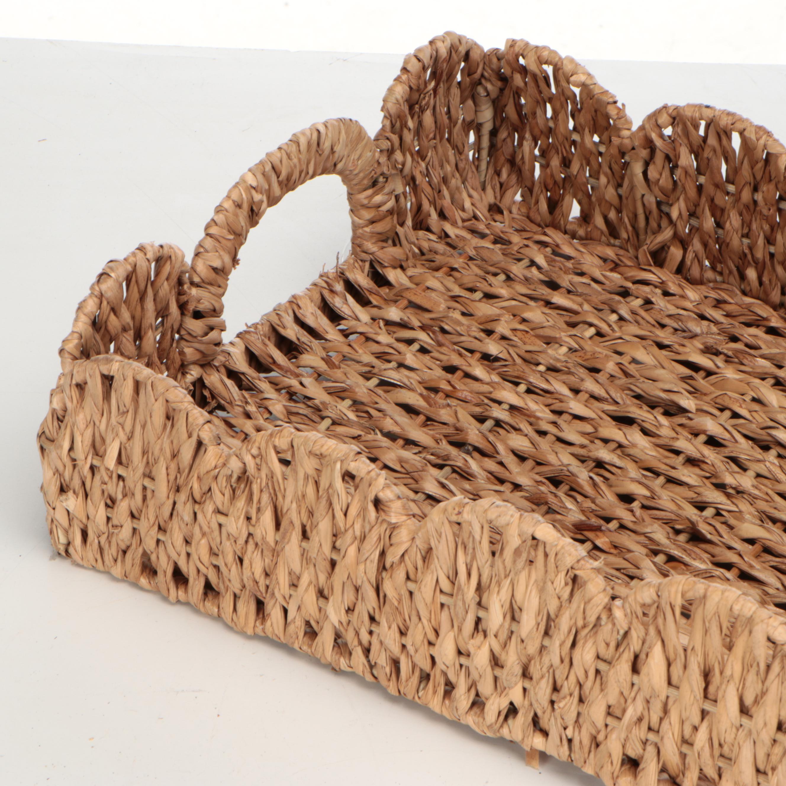 Wicker Tray with Nambé Metal Tray and Plates and Other Wood Cutting Boards