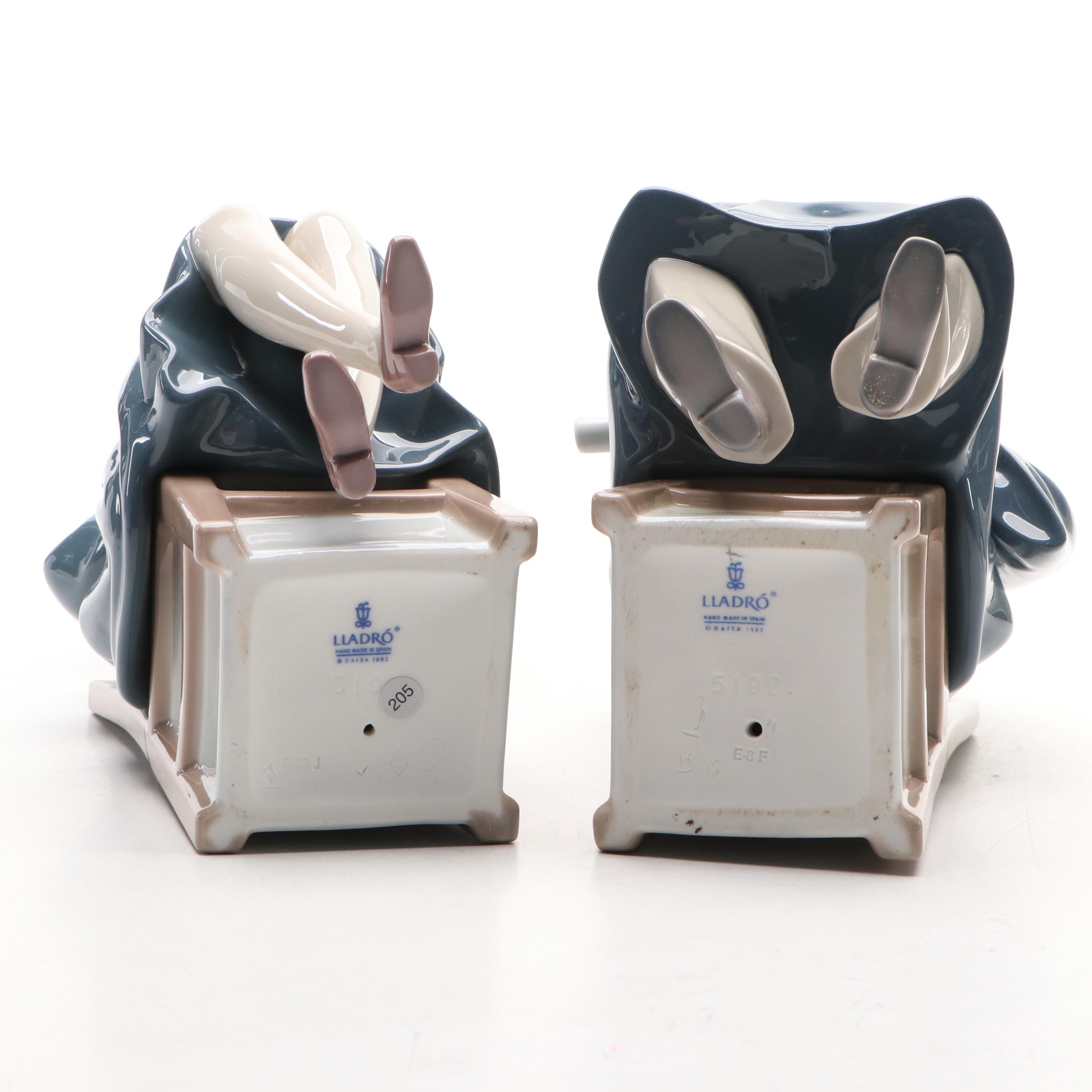 Lladró "Girl Graduate" and "Boy Graduate" Porcelain Figures