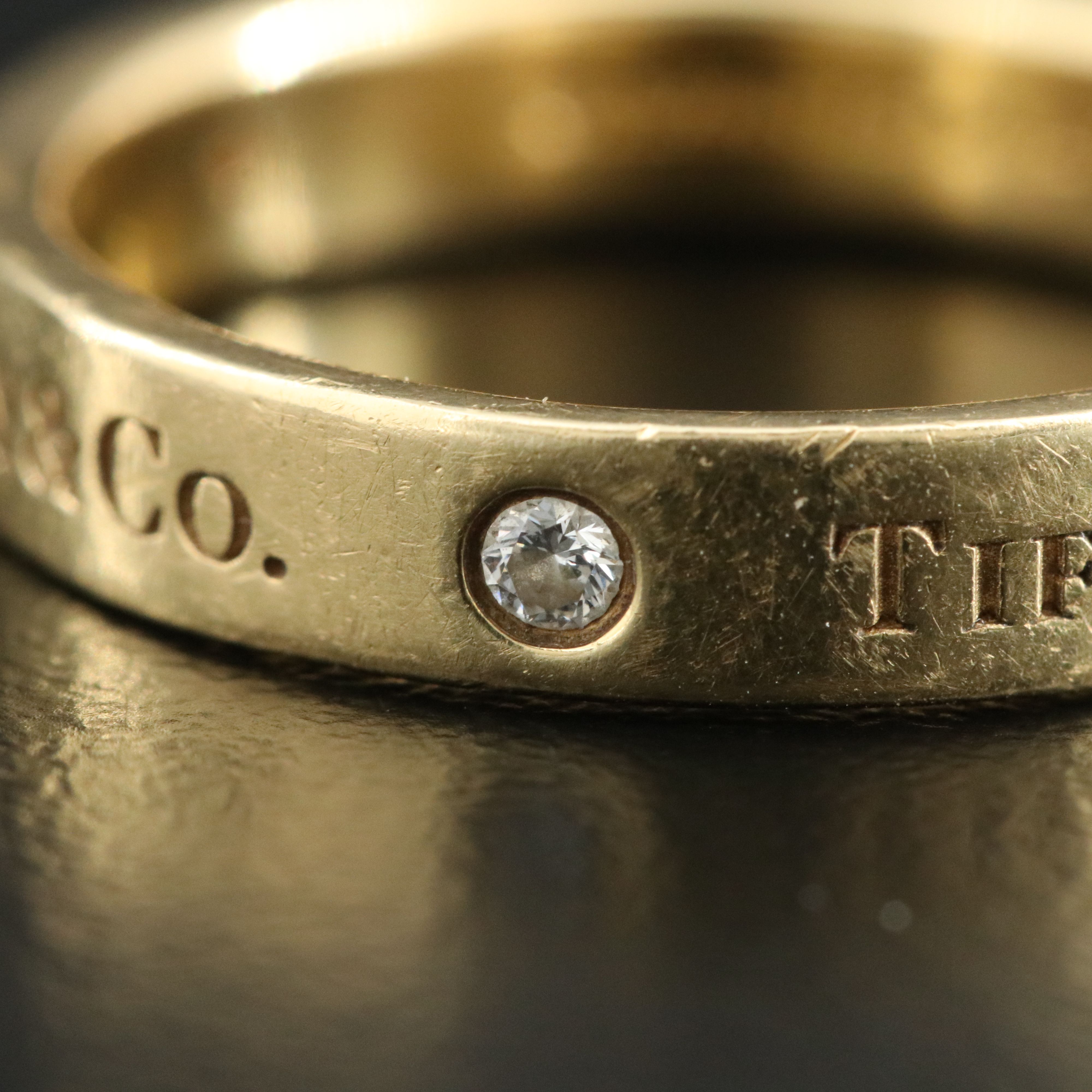 Tiffany & Co. 18K Logo Band Ring with Diamond Accents