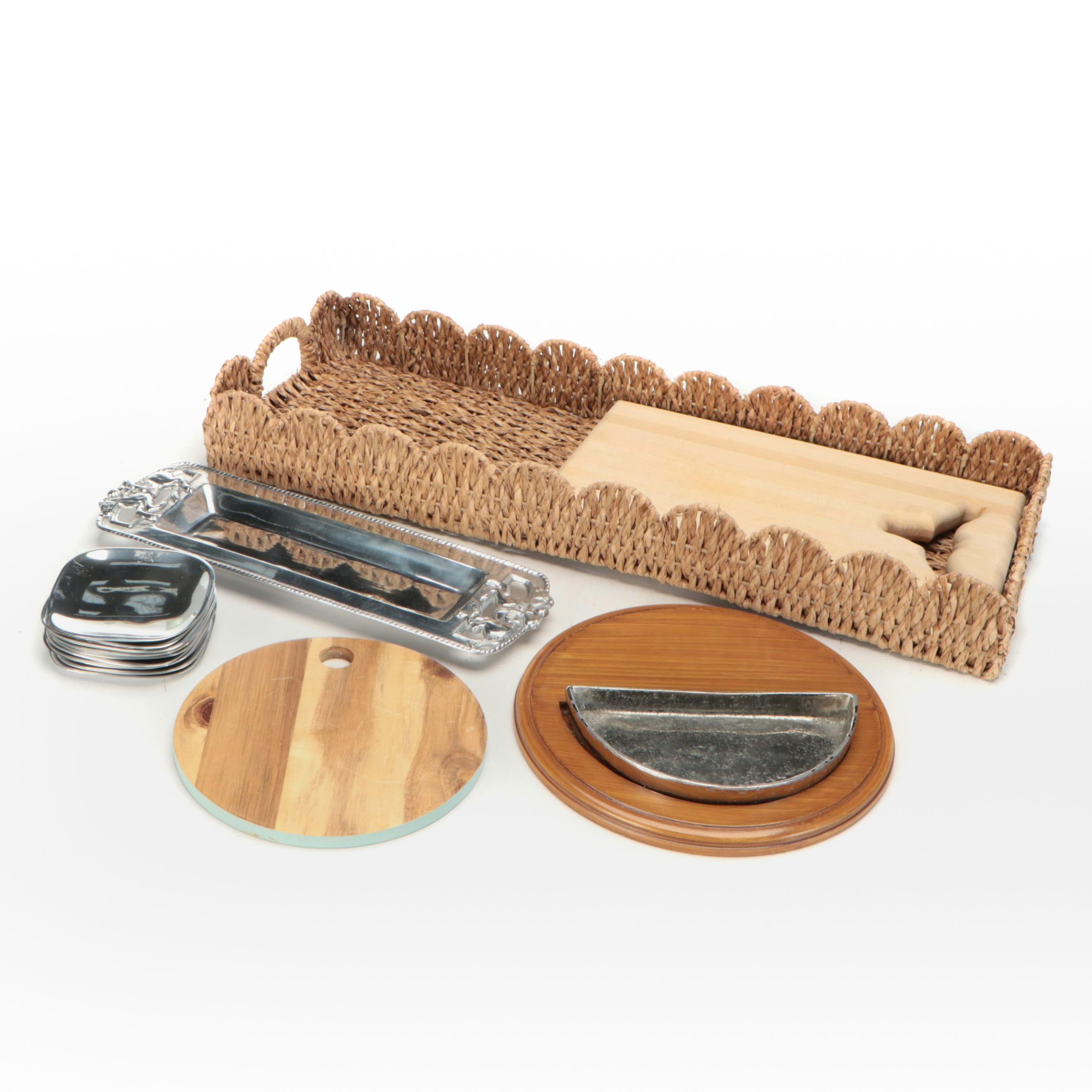 Wicker Tray with Nambé Metal Tray and Plates and Other Wood Cutting Boards