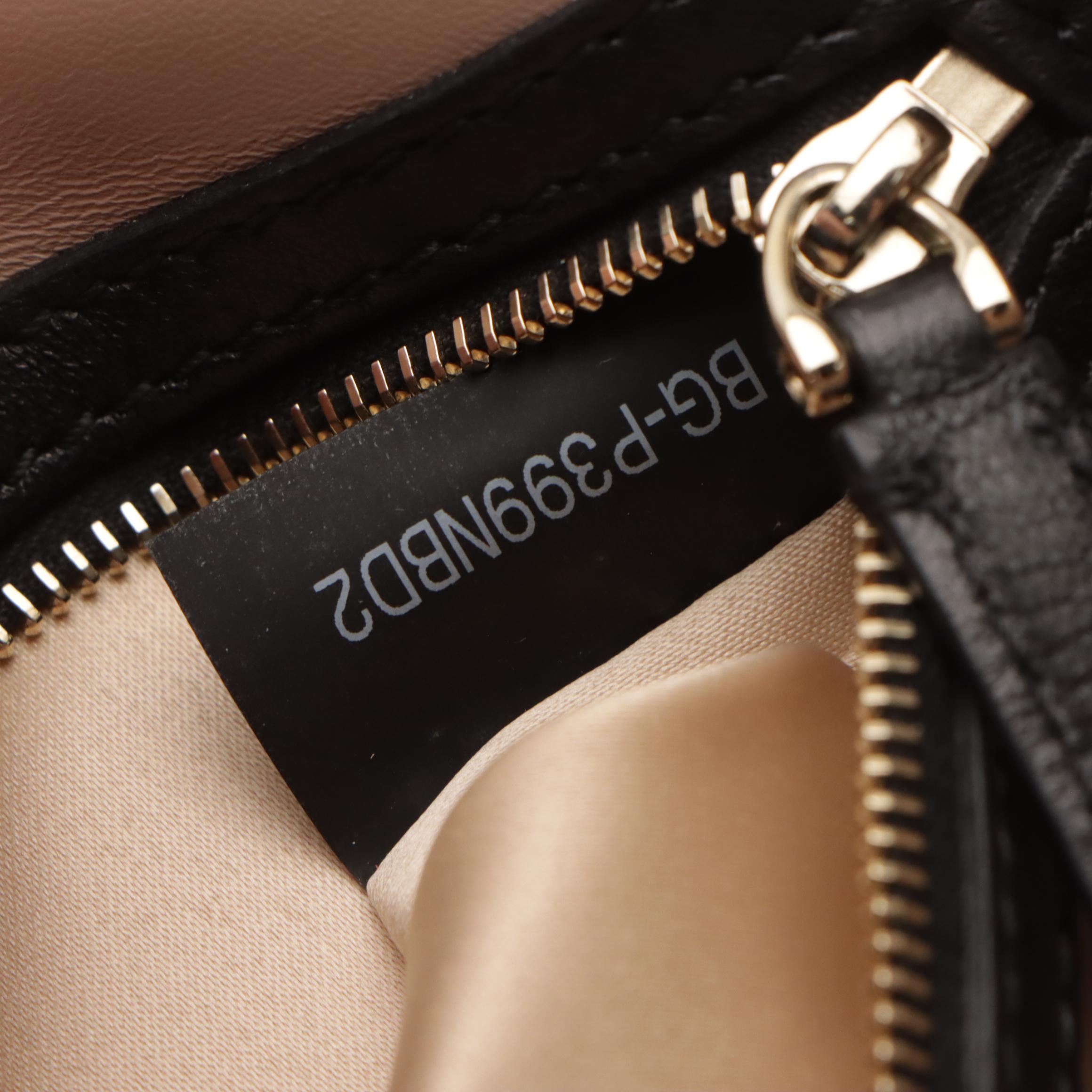 Valentino Garavani Rockstud Front Flap Clutch in Studded Black Lambskin Leather