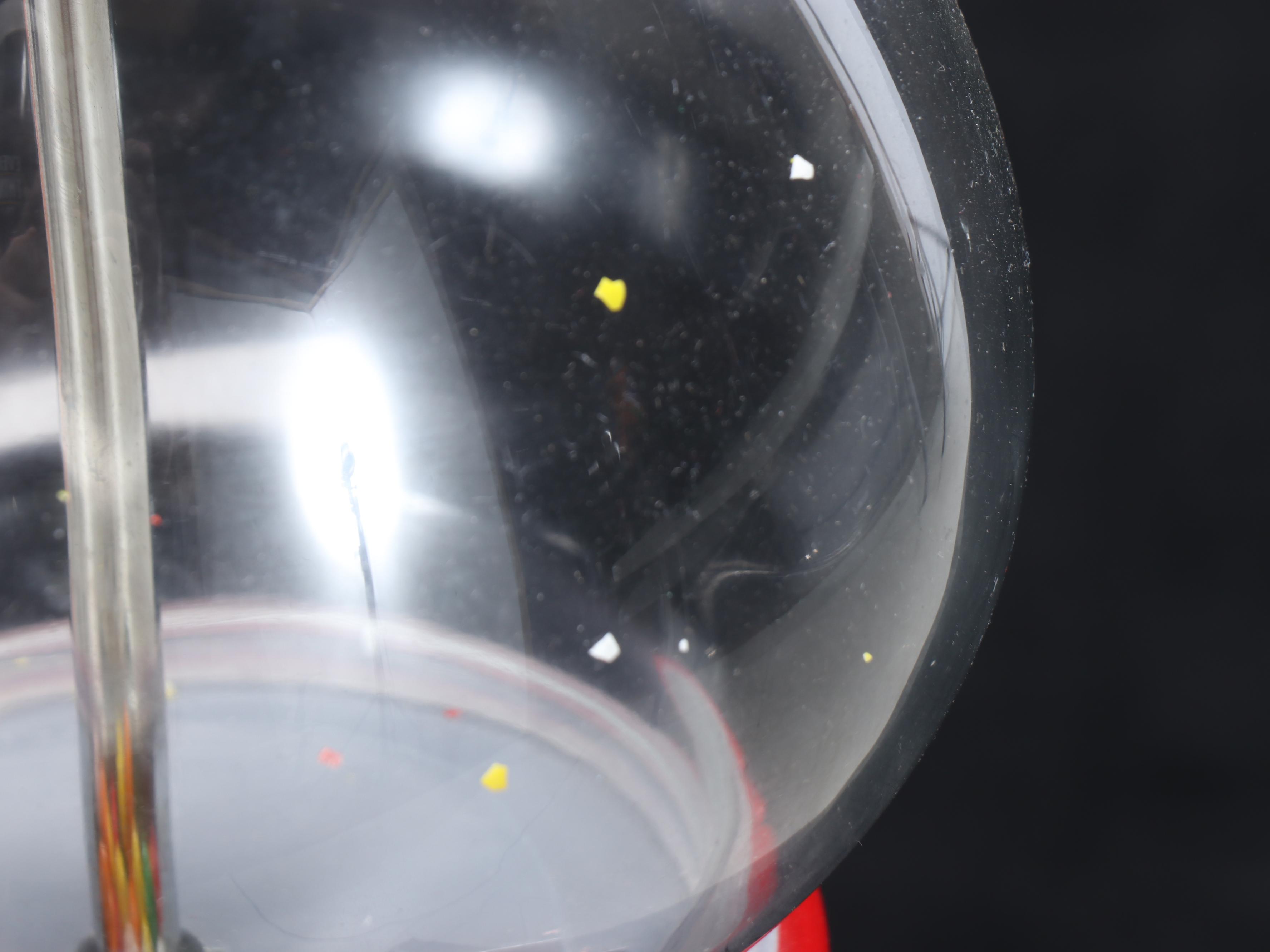 Red Gumball Dispenser on Clawfoot Stand