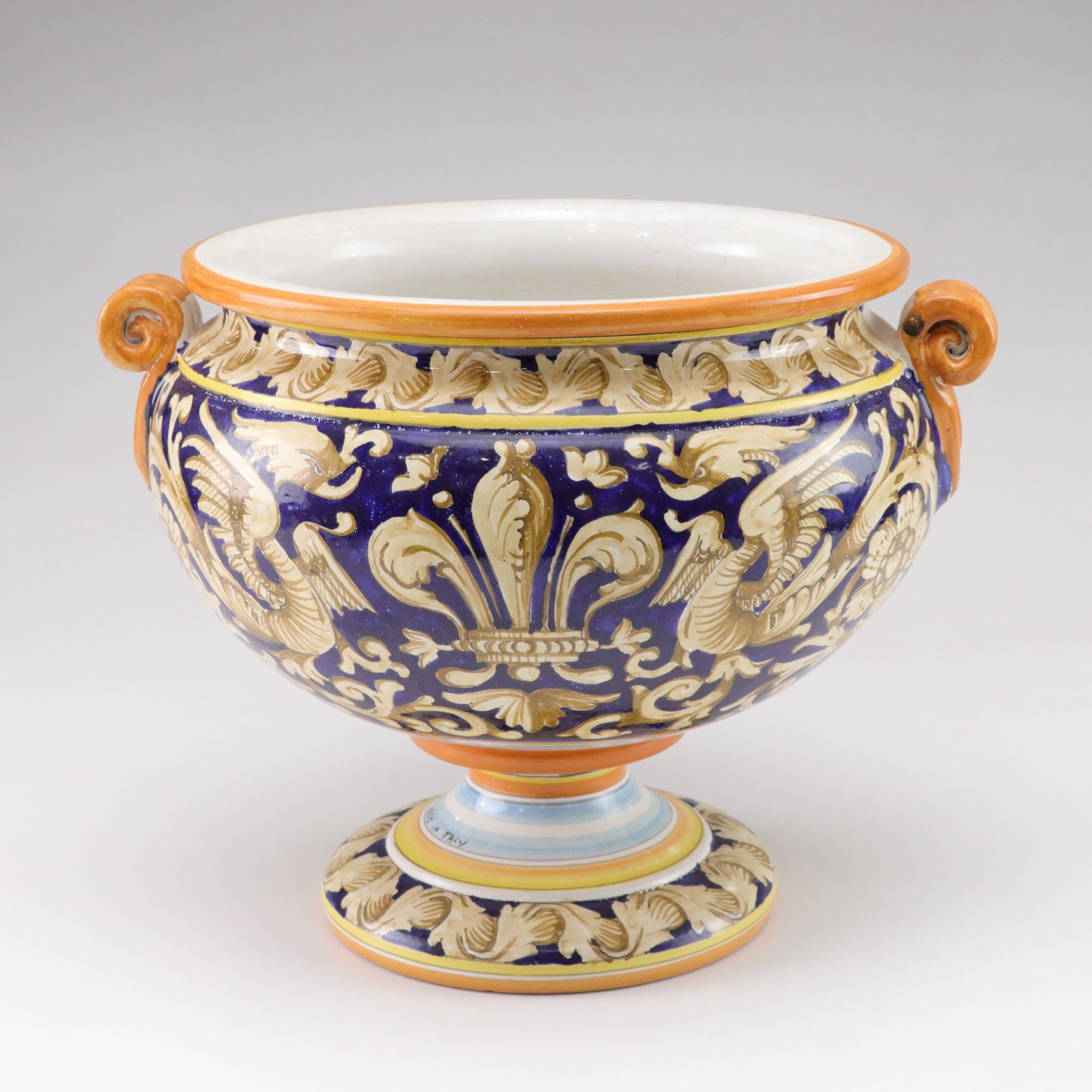Italian-Made Footed Jardiniere Features Scroll Handles and Angel Motif