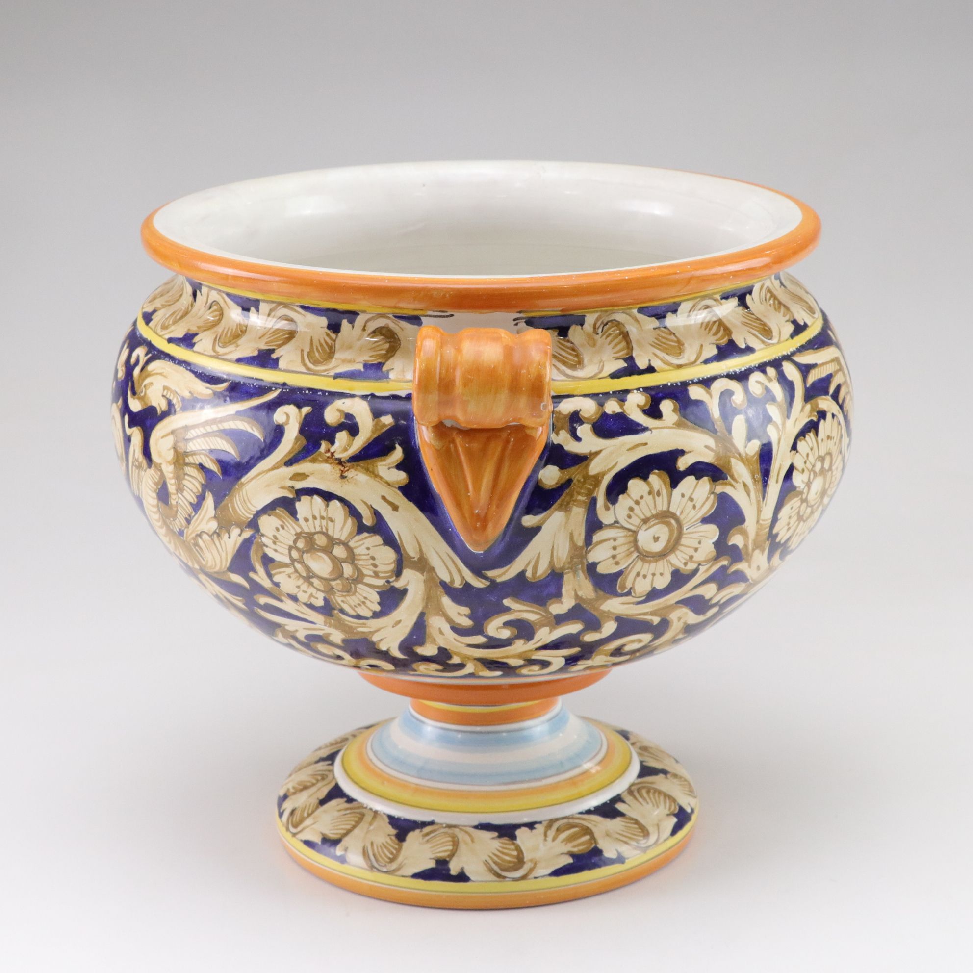 Italian-Made Footed Jardiniere Features Scroll Handles and Angel Motif