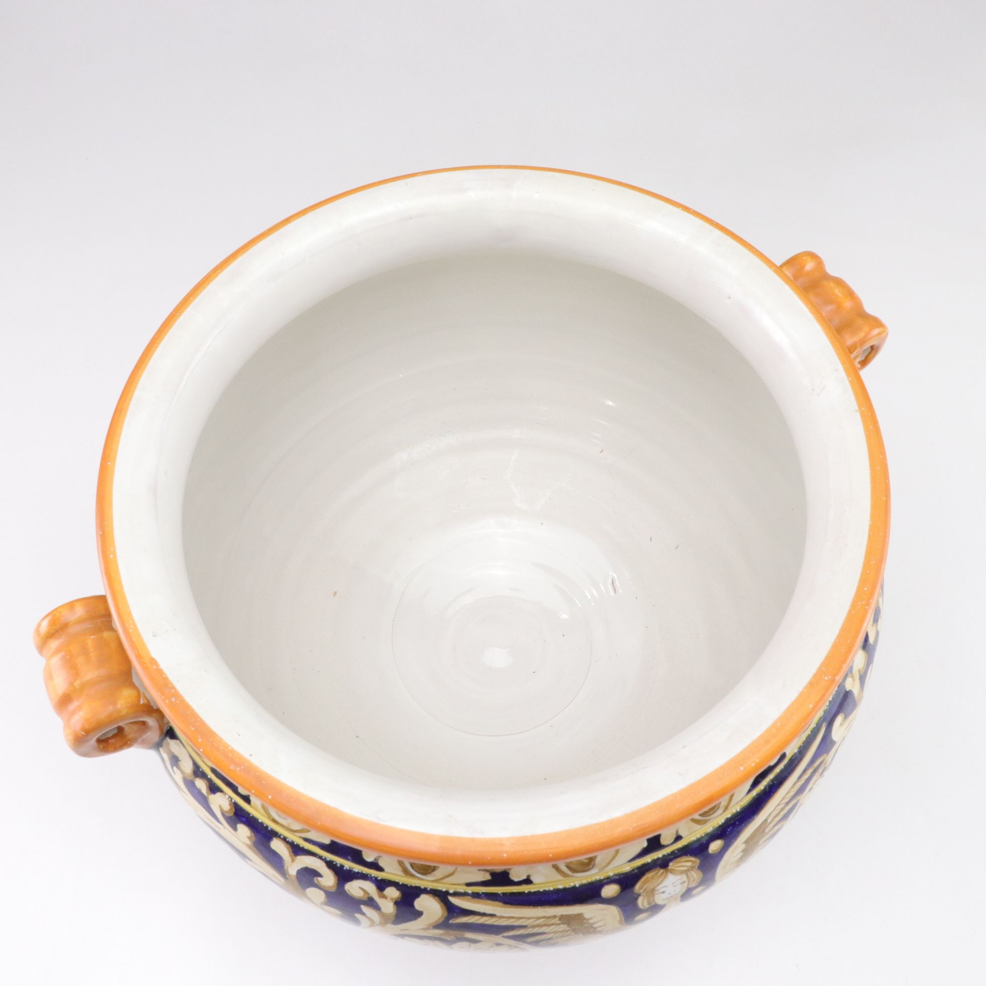 Italian-Made Footed Jardiniere Features Scroll Handles and Angel Motif