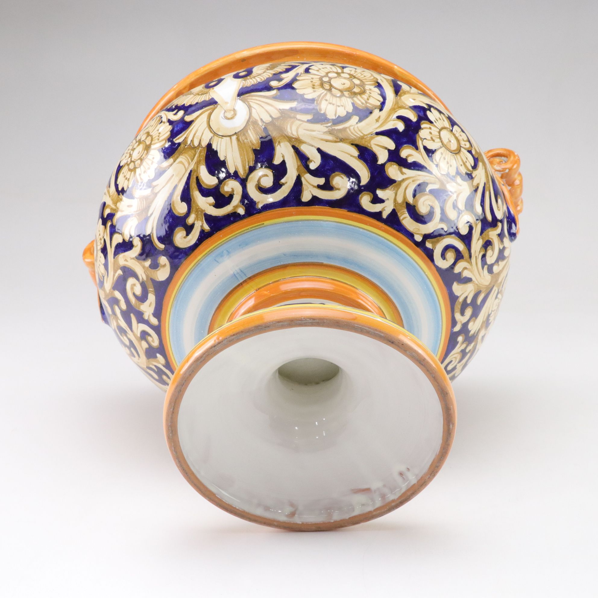 Italian-Made Footed Jardiniere Features Scroll Handles and Angel Motif