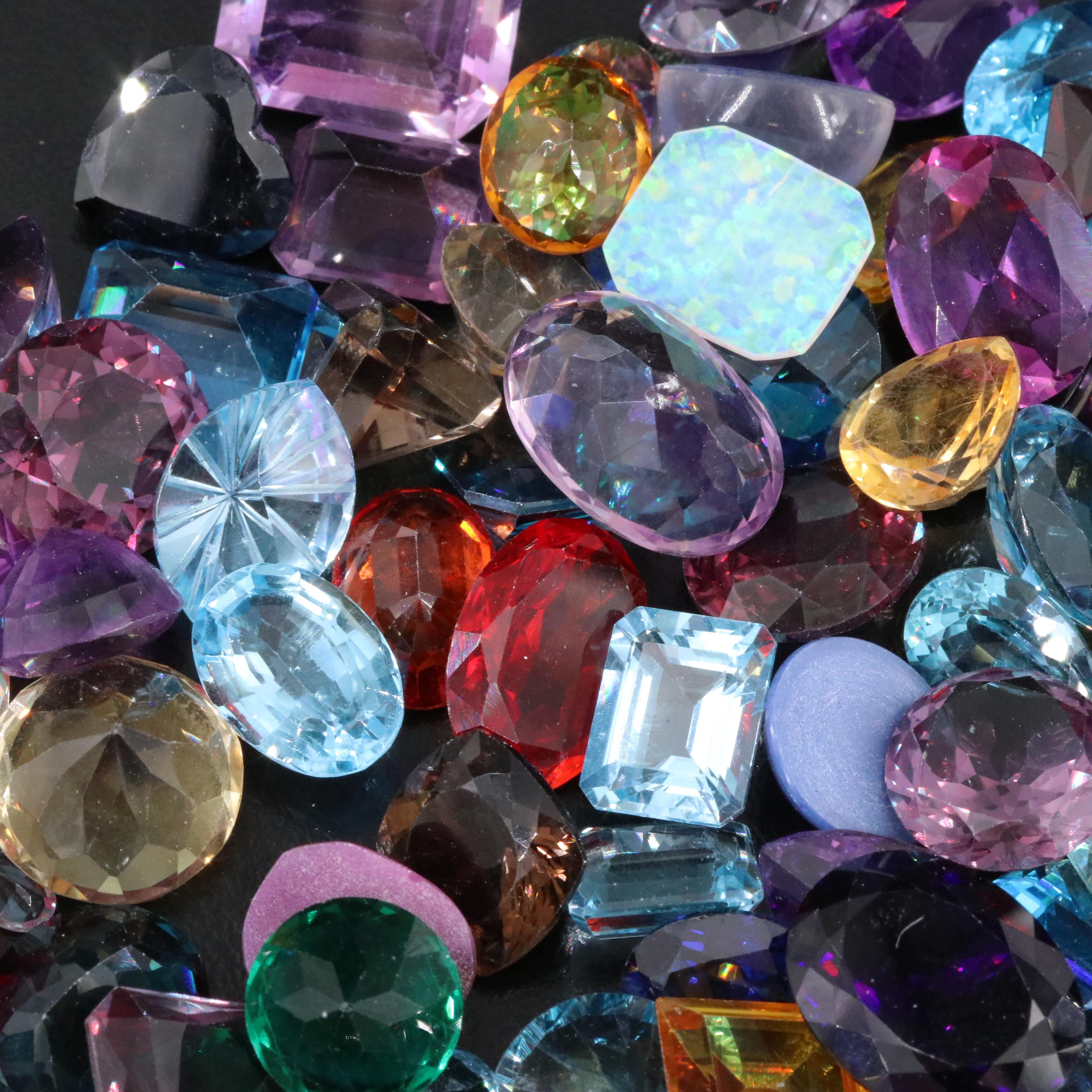 Loose 1,070.00 CTW Gemstone Lot Including Lab Grown Sapphire, Citrine and Topaz