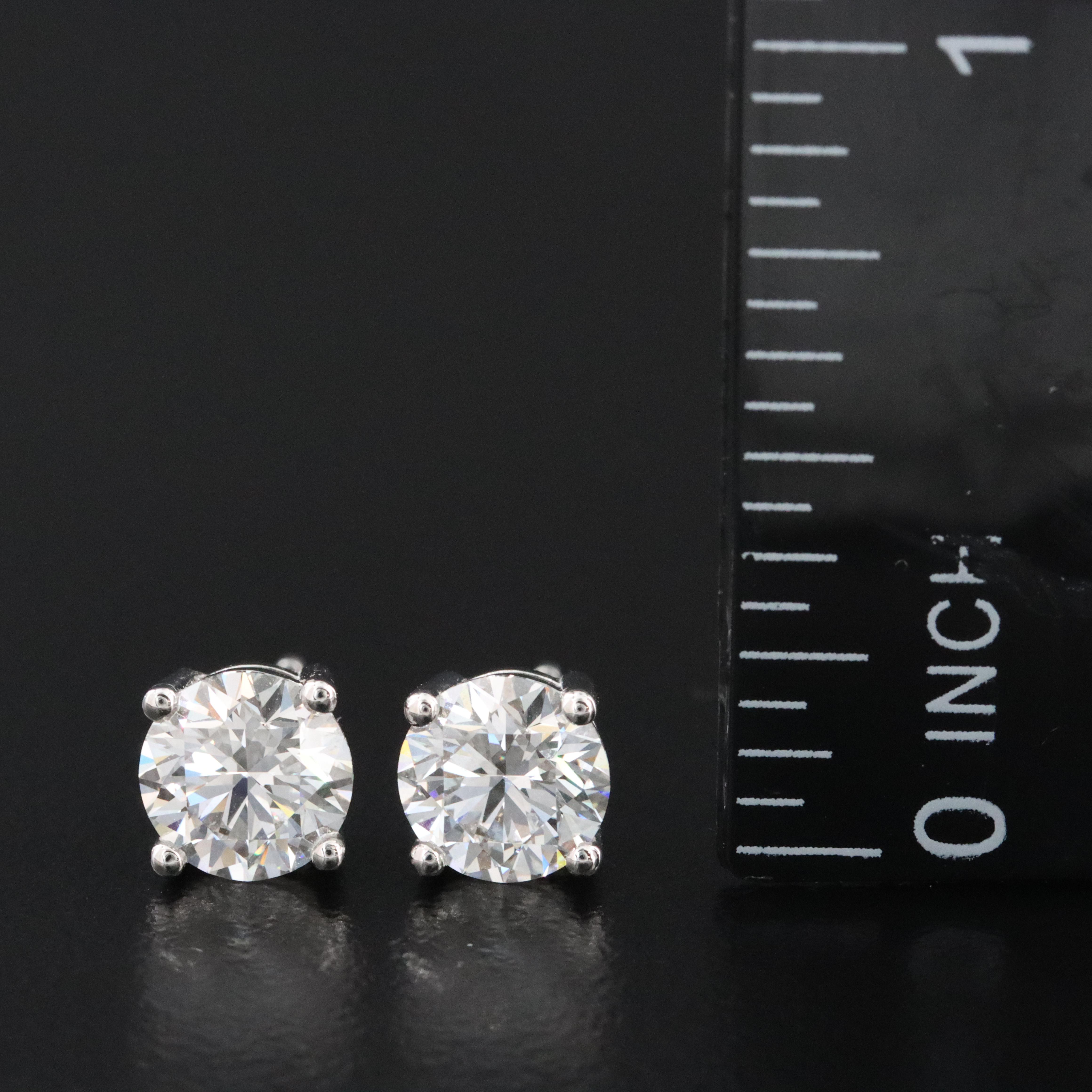 Platinum 2.11 CTW Lab Grown Diamond Solitaire Earrings with Online IGI Reports