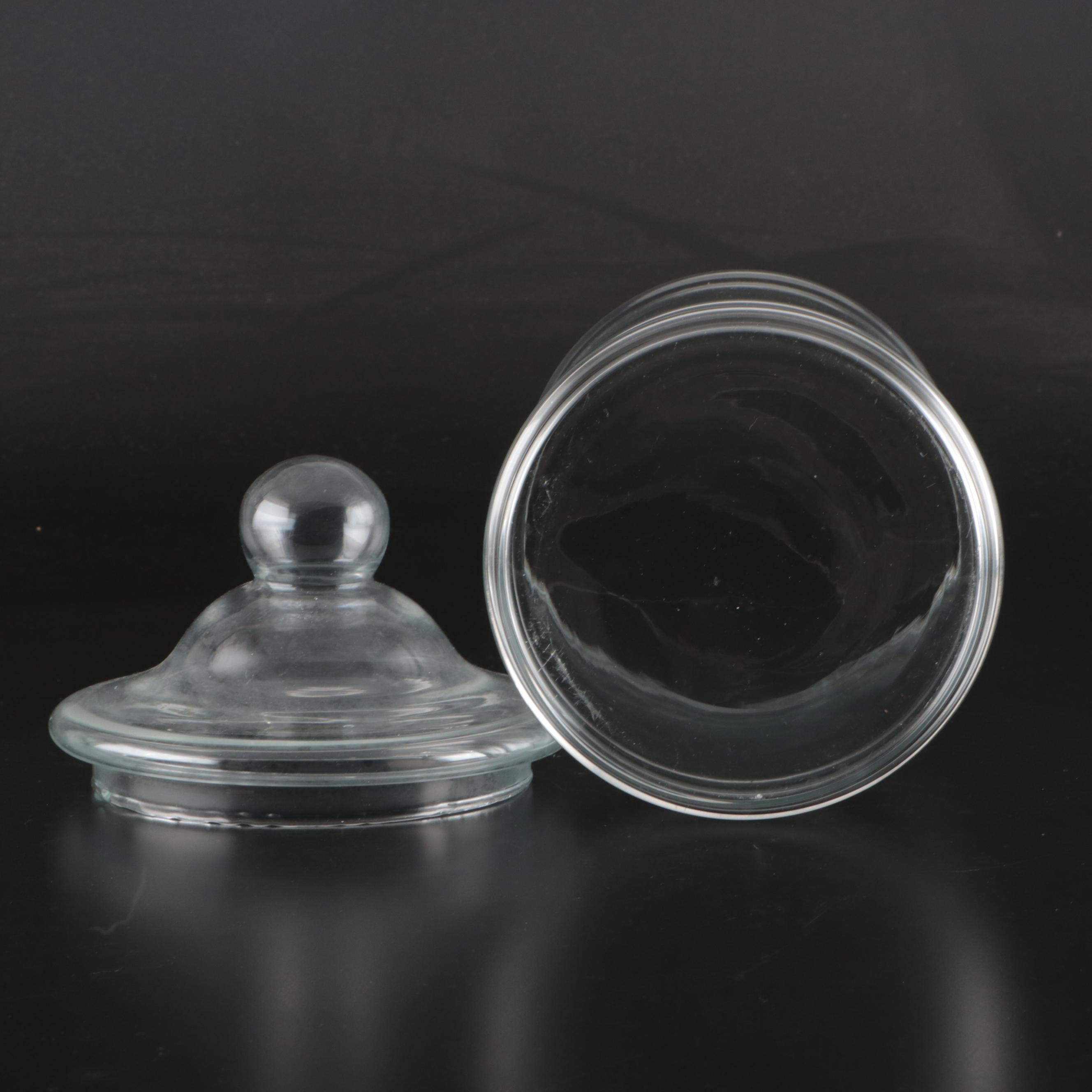 Footed and Other Glass Apothecary Jars