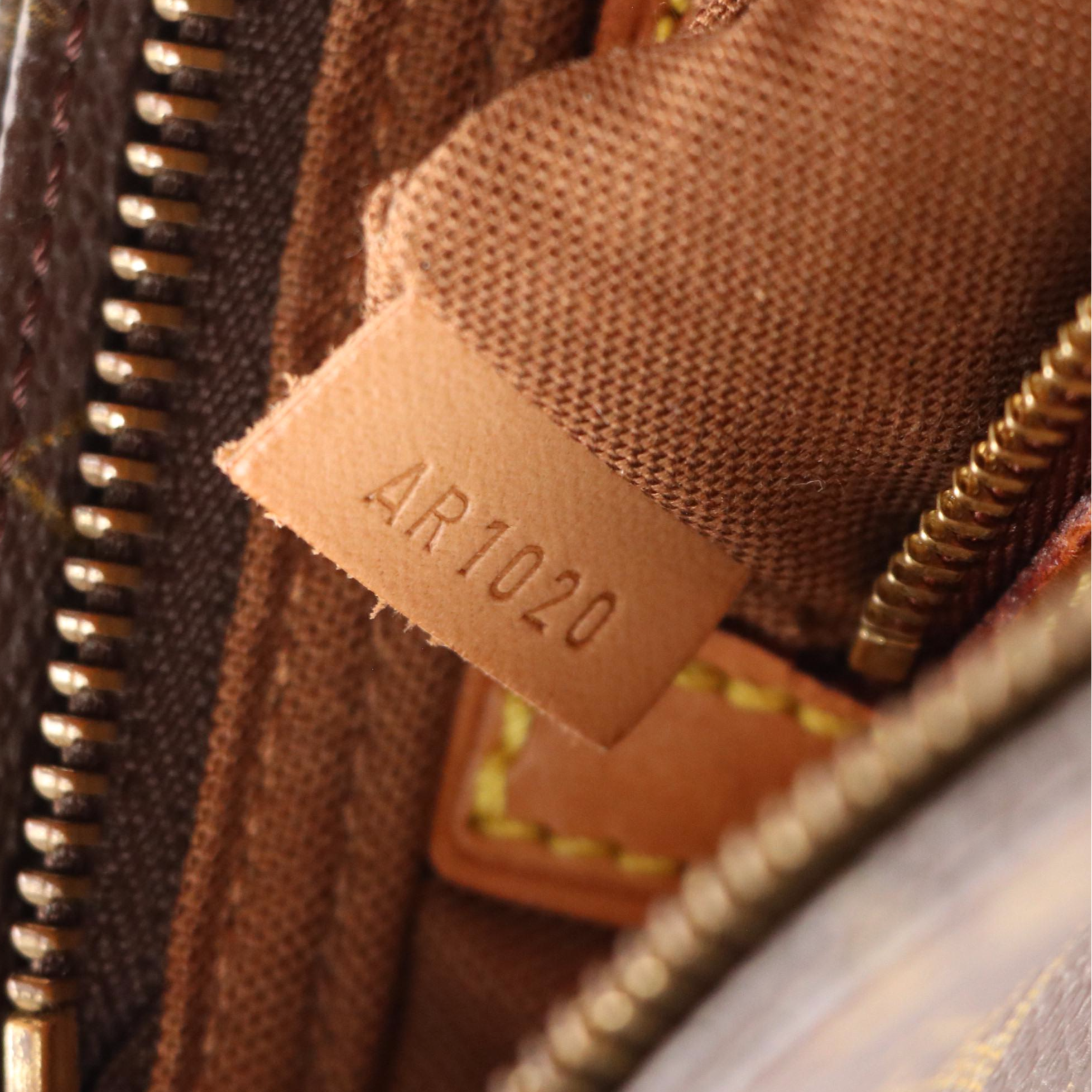 Louis Vuitton Trotteur Shoulder Bag in Monogram Canvas and Leather Trim