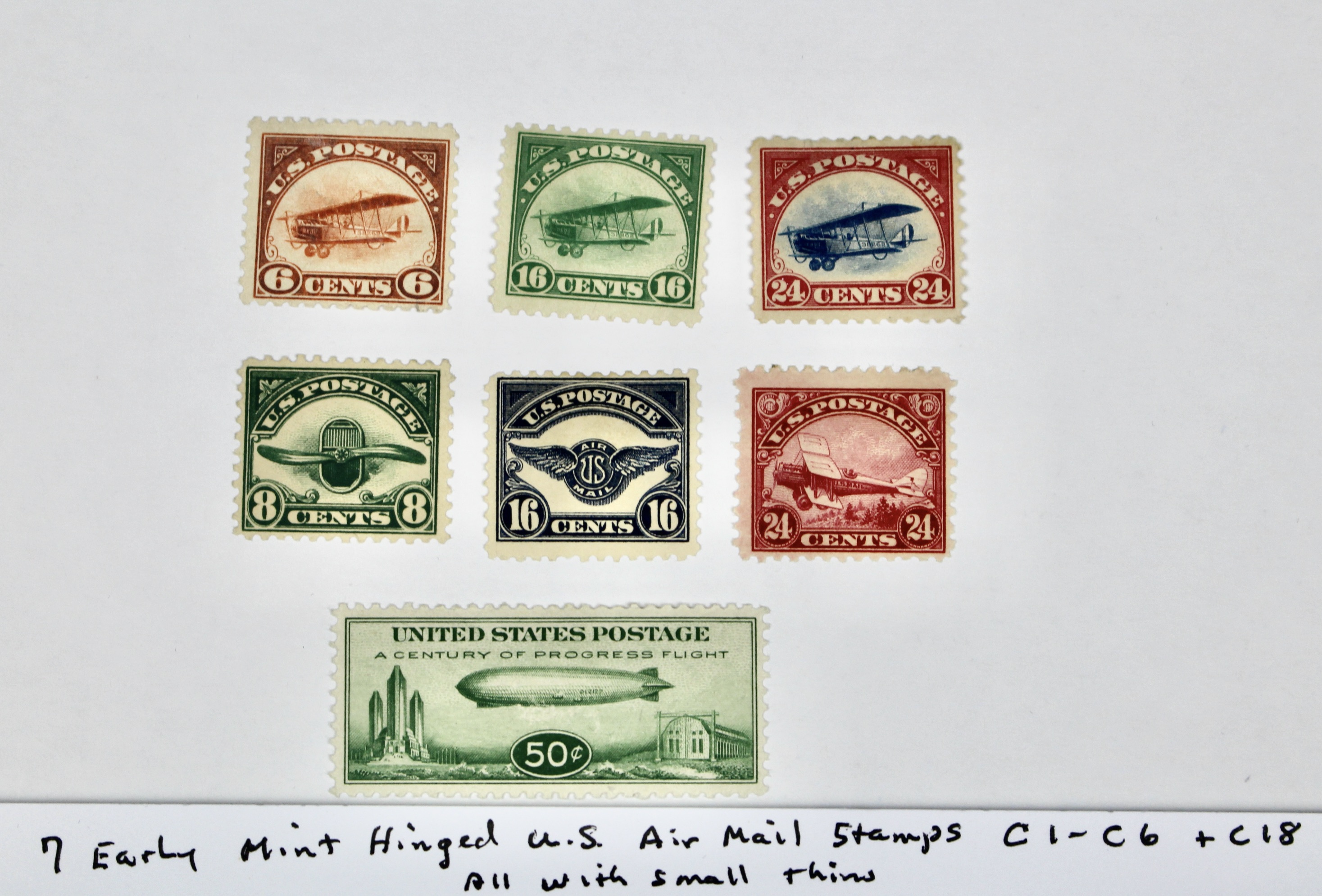 Seven Early Mint Hinged U.S. Air Mail Stamps