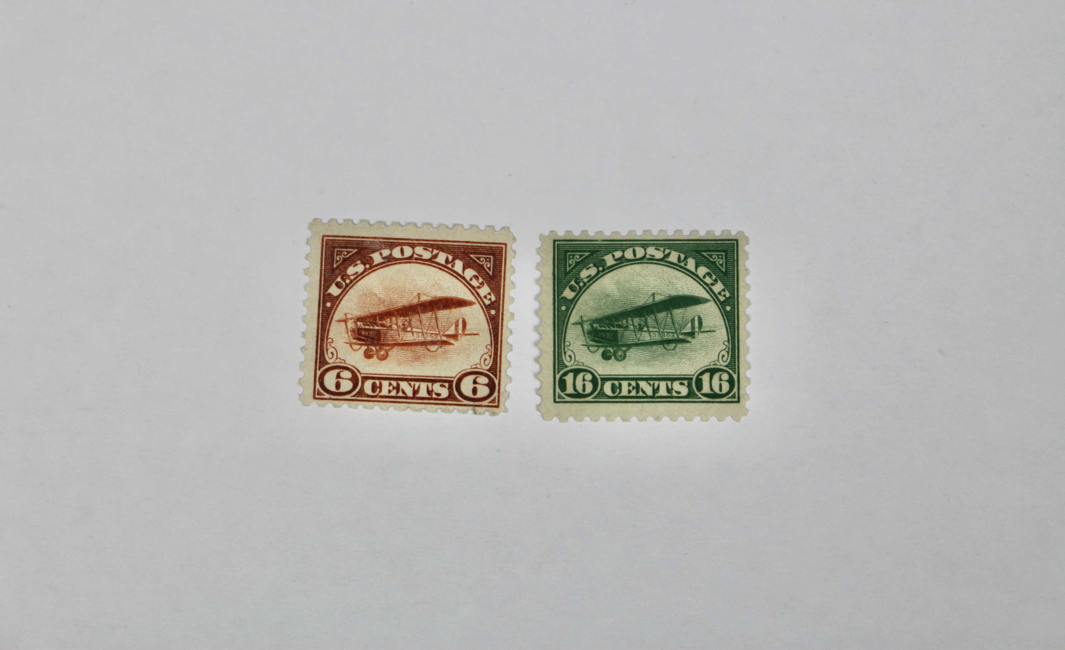 Seven Early Mint Hinged U.S. Air Mail Stamps