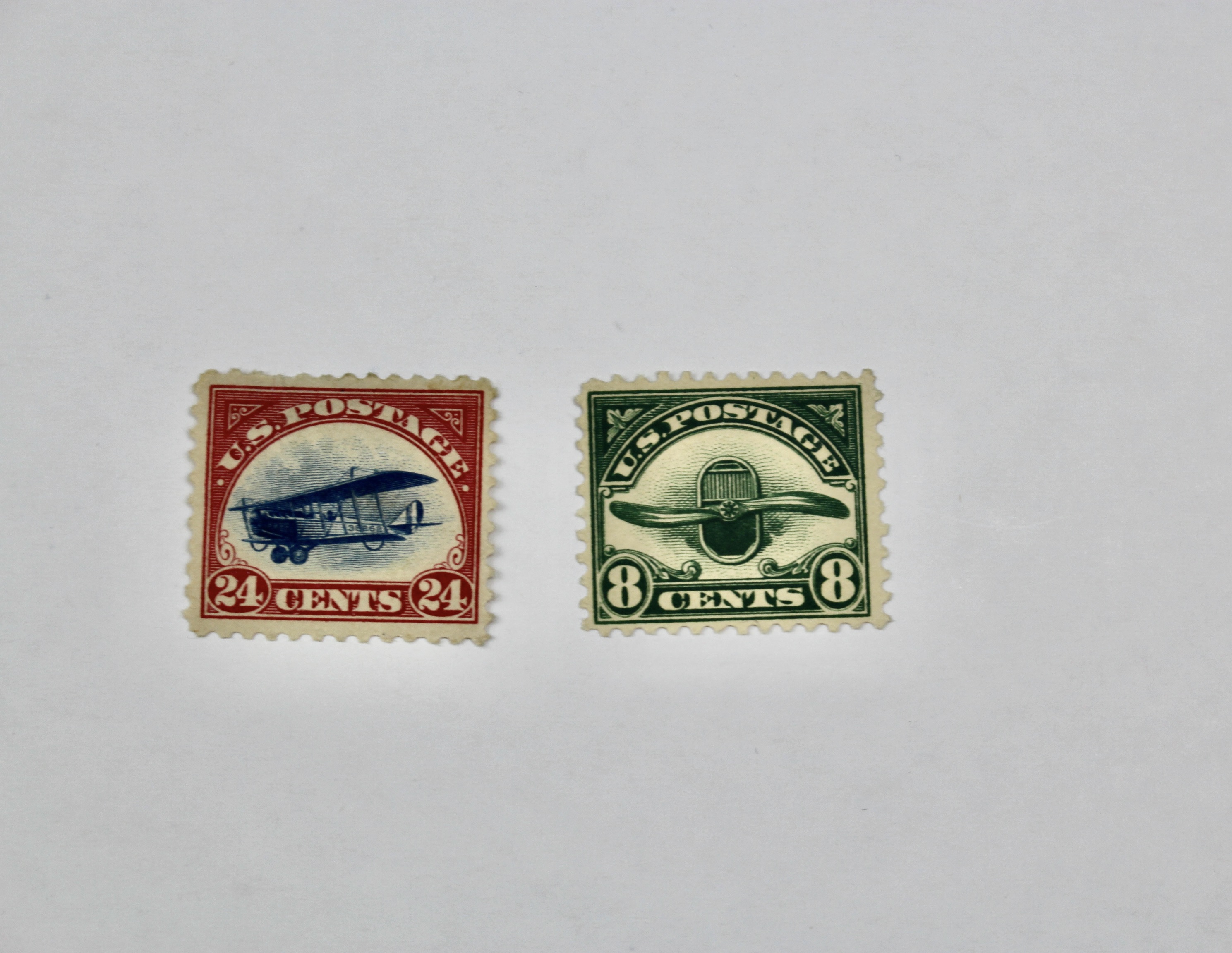 Seven Early Mint Hinged U.S. Air Mail Stamps