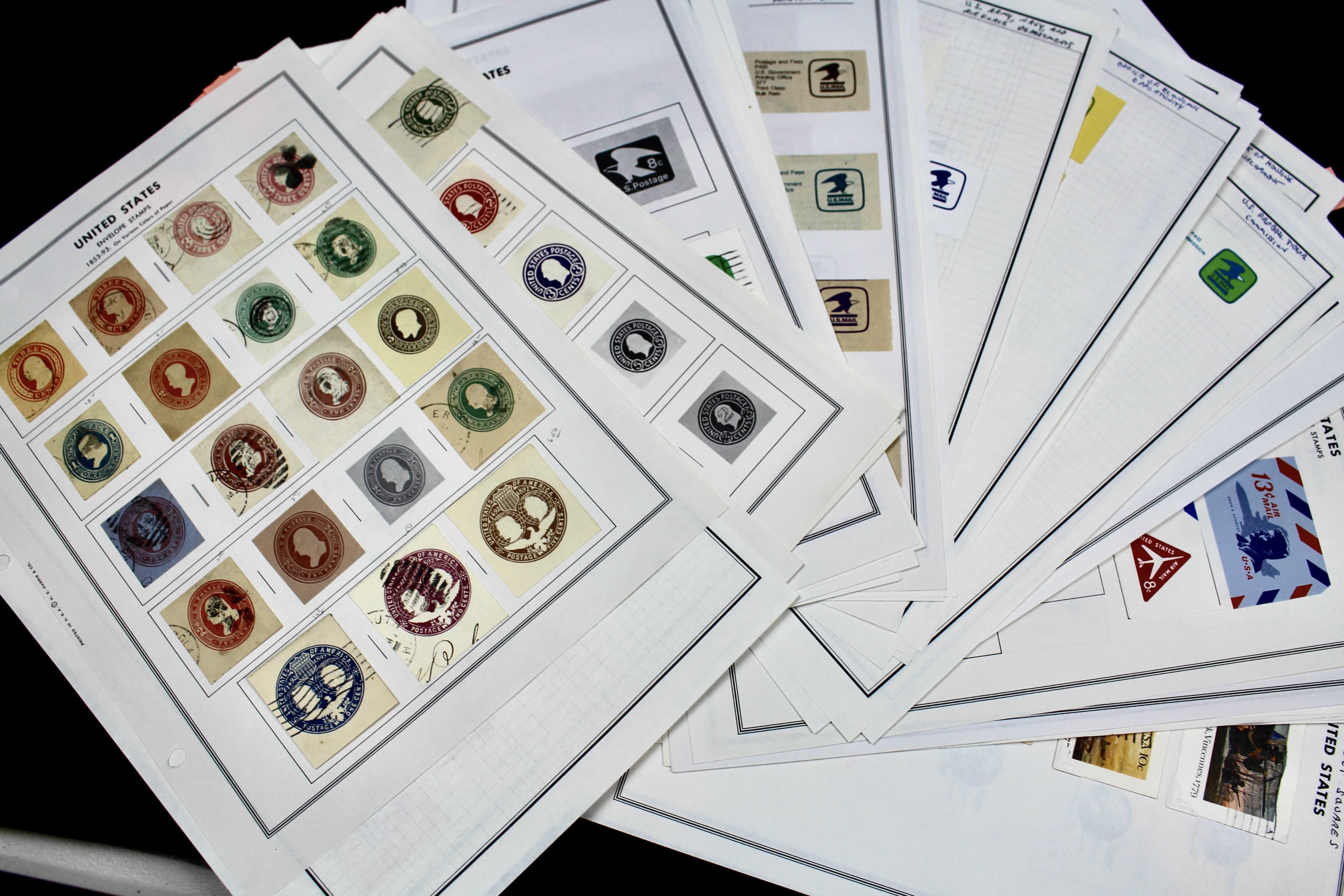 Fifty Pages of Cut Corner Postage Stamps, Mint and Used