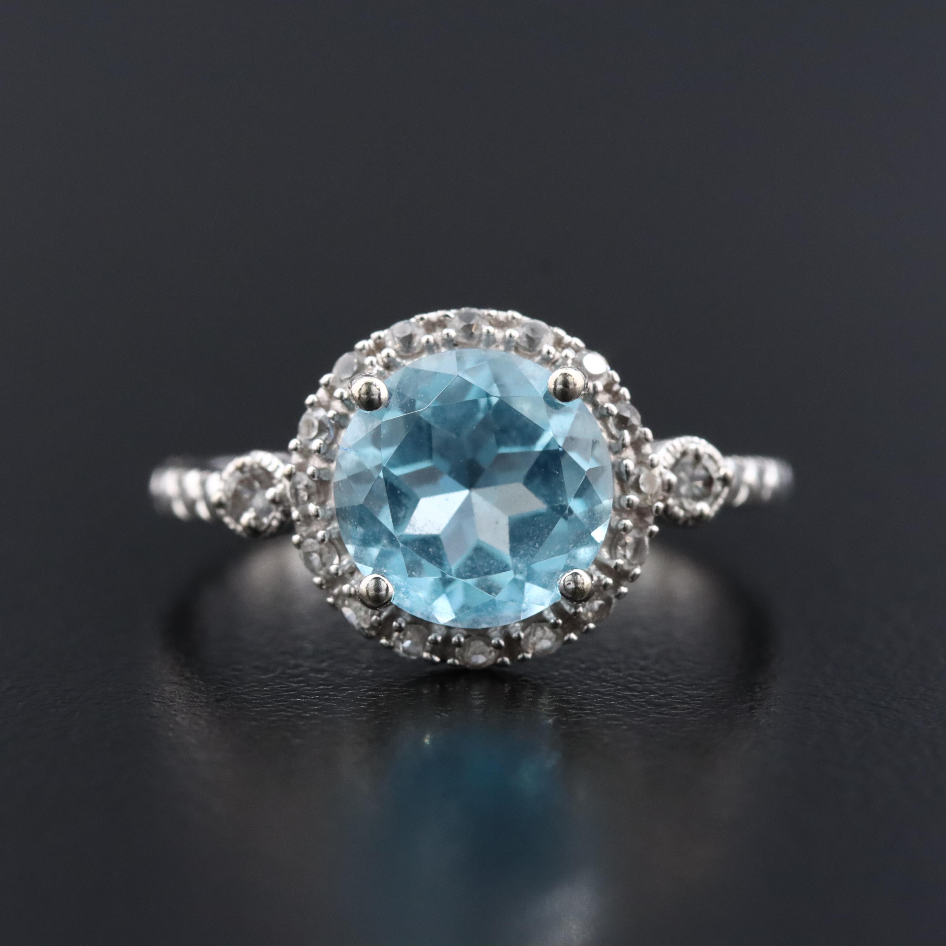 10K Swiss Blue Topaz and White Sapphire Halo Ring