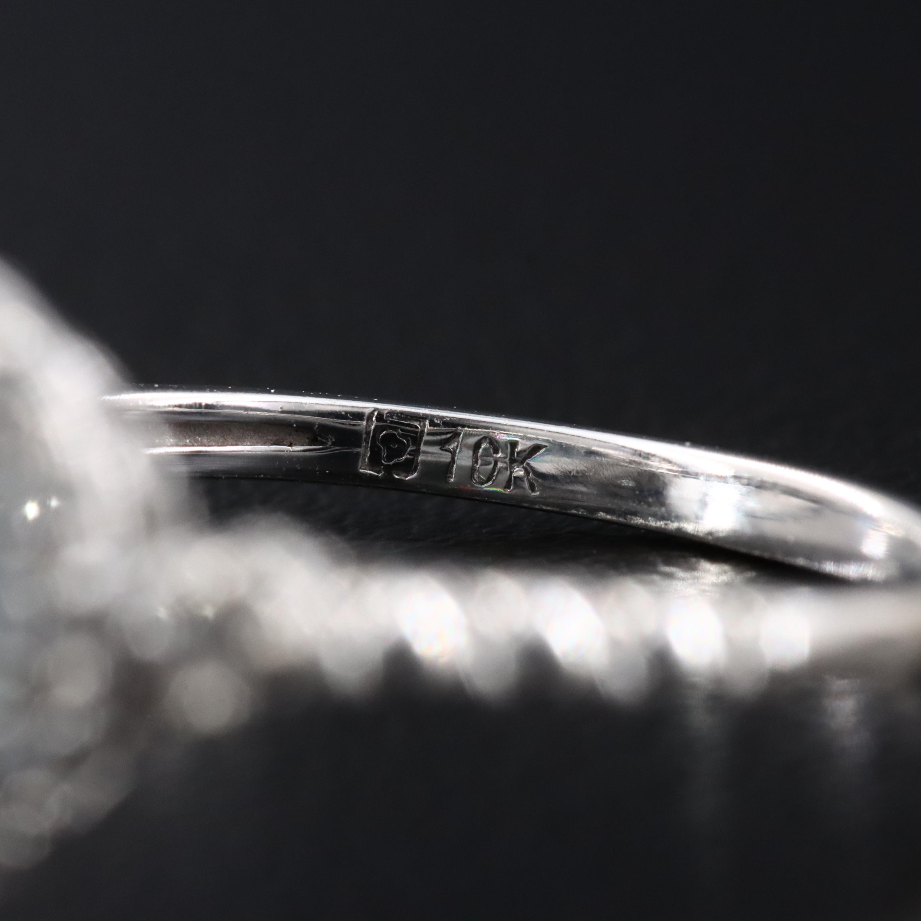 10K Swiss Blue Topaz and White Sapphire Halo Ring