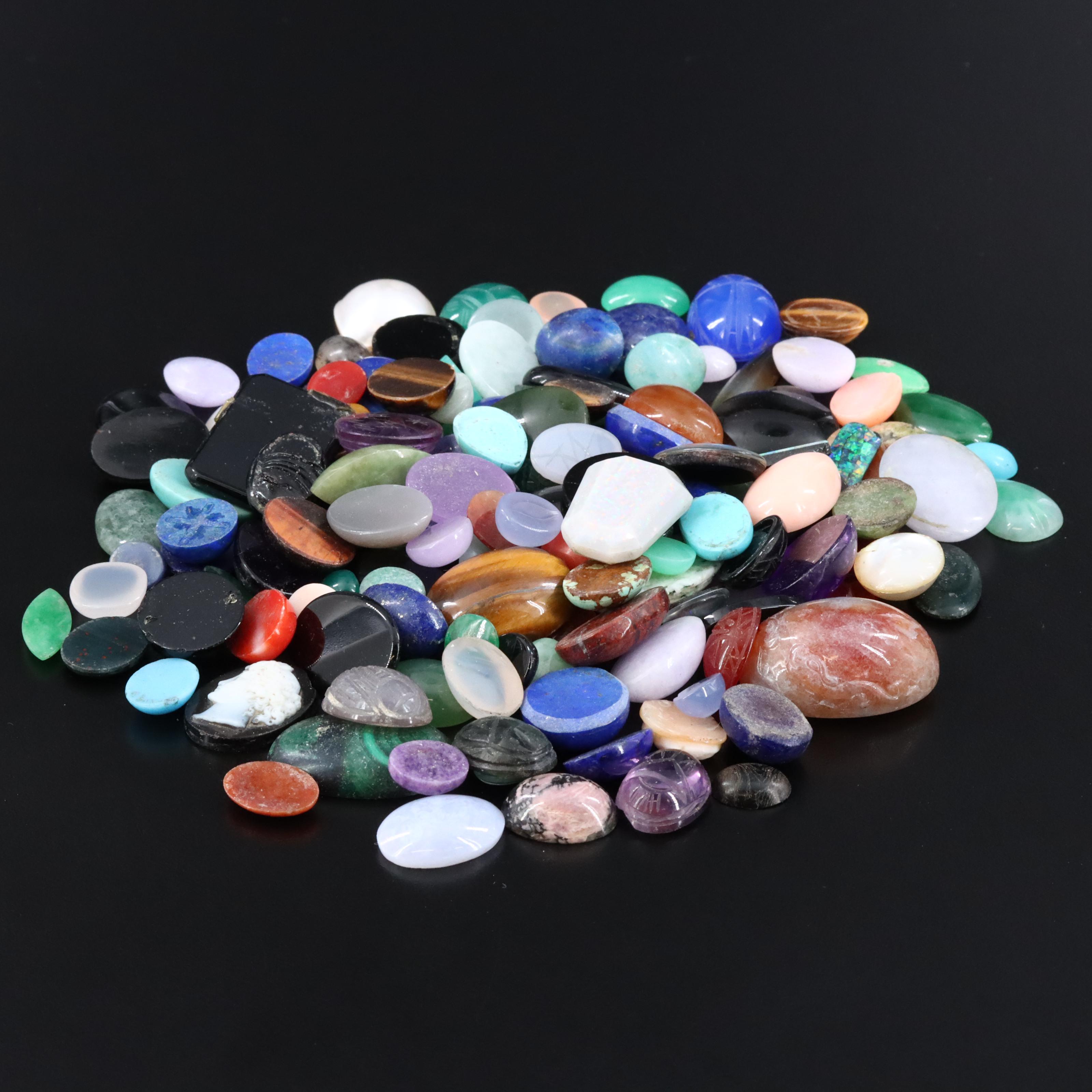 Loose Gemstone Lot Including Coral, Tiger's Eye and Agate