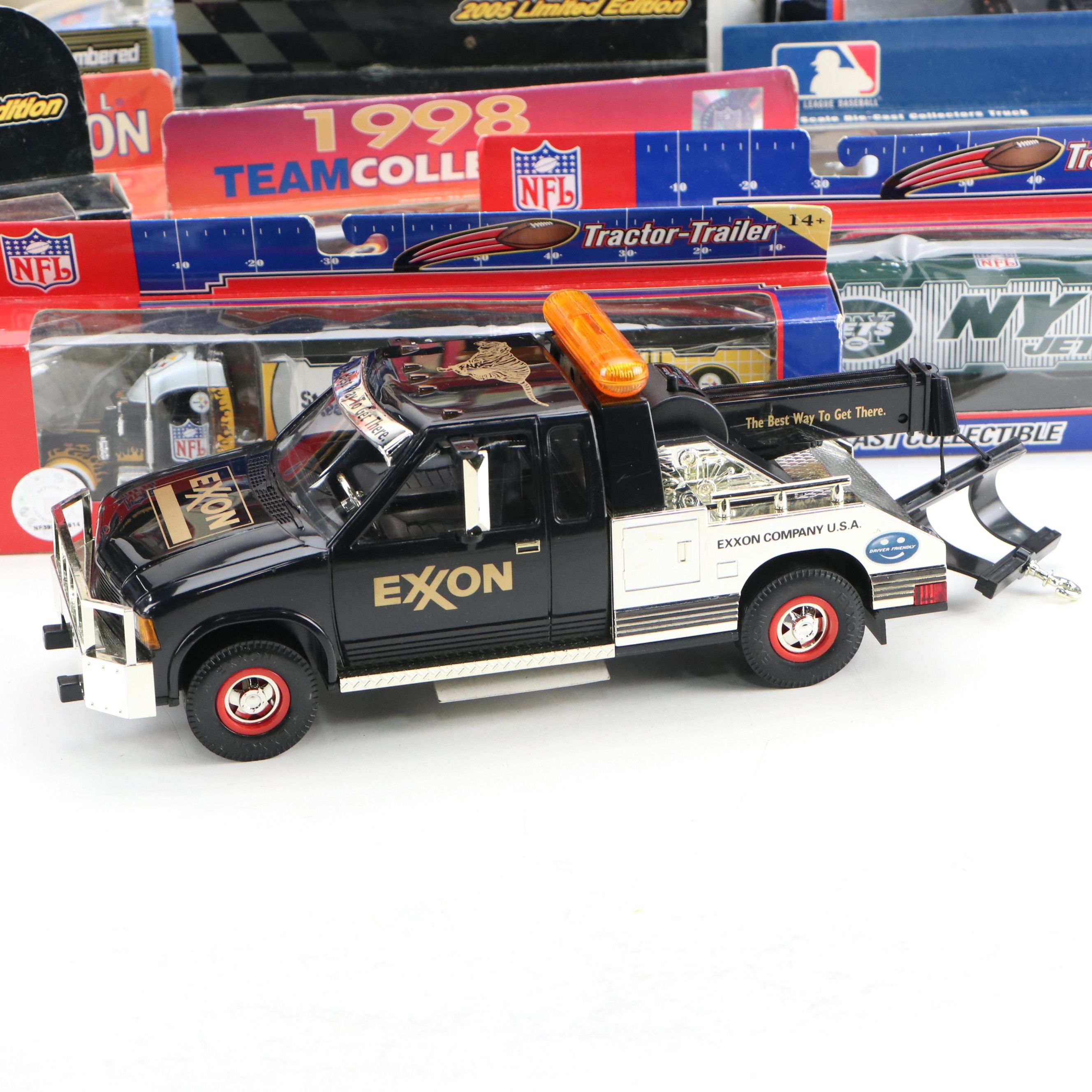 NAPA, Hess, and Other Toy Trucks with Toy Cars, Late 20th-Early 21st Century