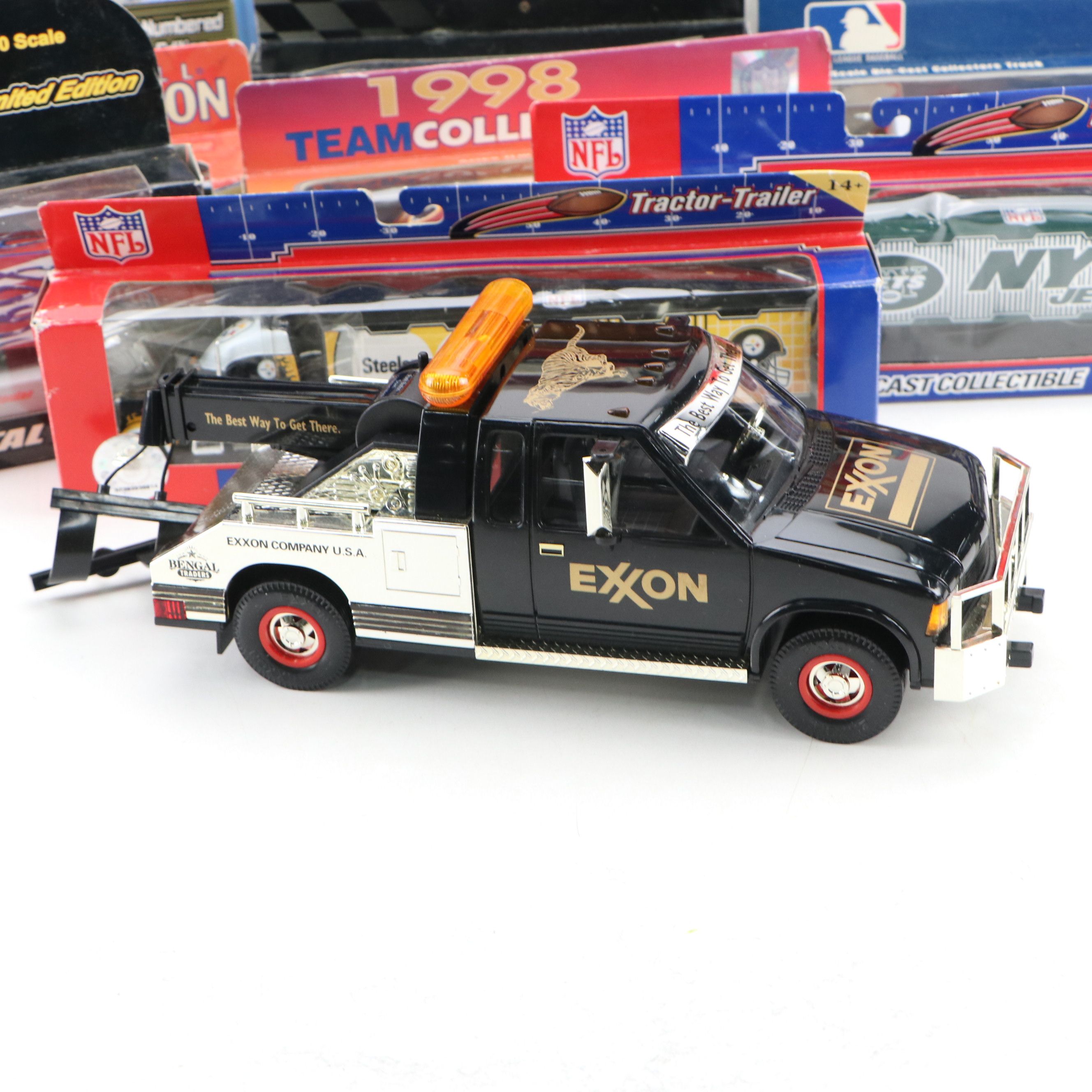 NAPA, Hess, and Other Toy Trucks with Toy Cars, Late 20th-Early 21st Century