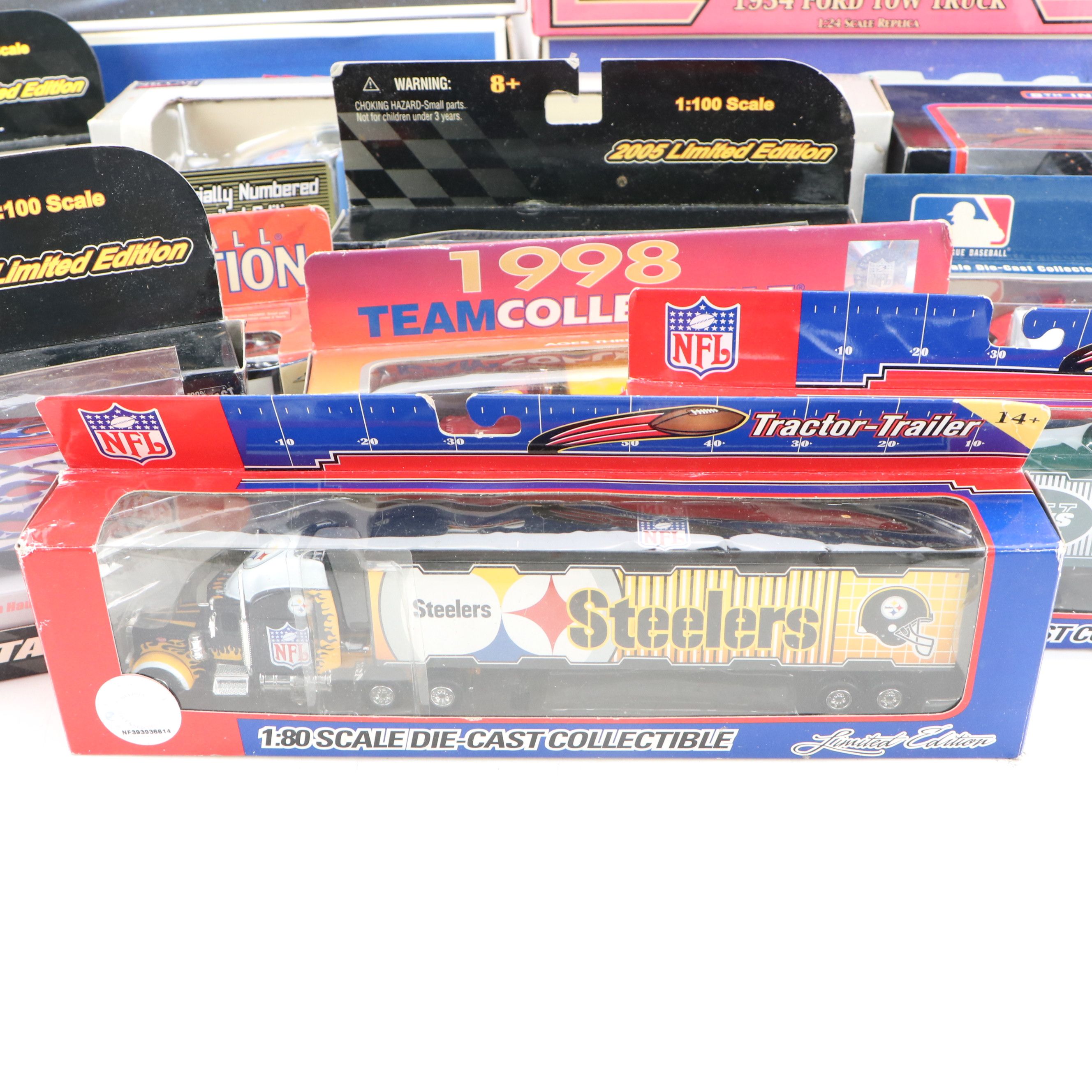 NAPA, Hess, and Other Toy Trucks with Toy Cars, Late 20th-Early 21st Century