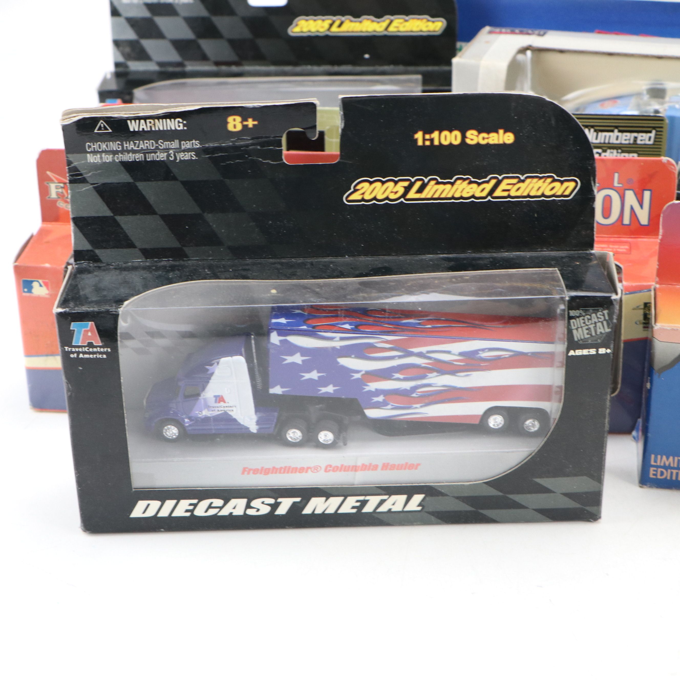 NAPA, Hess, and Other Toy Trucks with Toy Cars, Late 20th-Early 21st Century