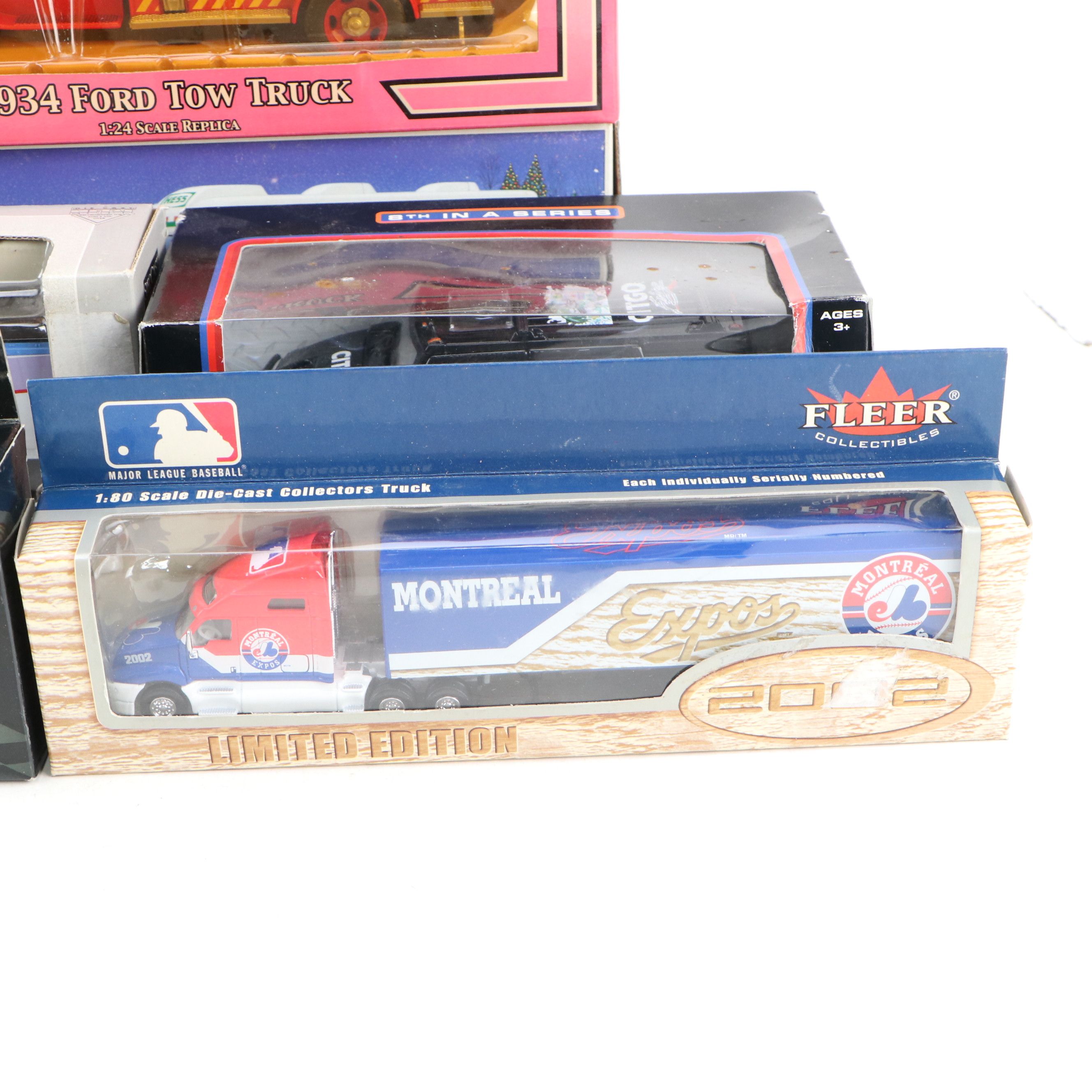 NAPA, Hess, and Other Toy Trucks with Toy Cars, Late 20th-Early 21st Century