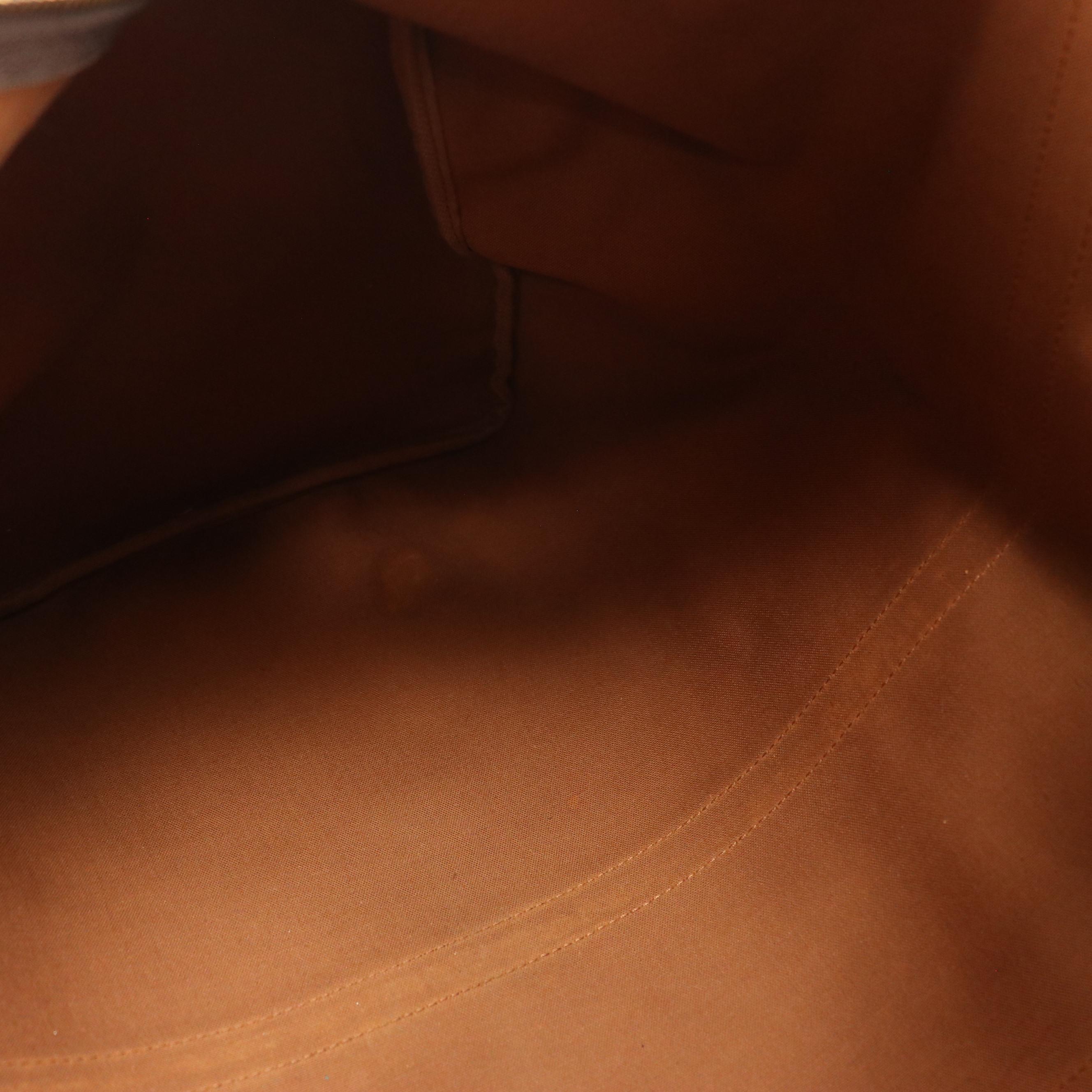 Louis Vuitton Keepall 60 Duffle Bag in Monogram Canvas and Leather Trim