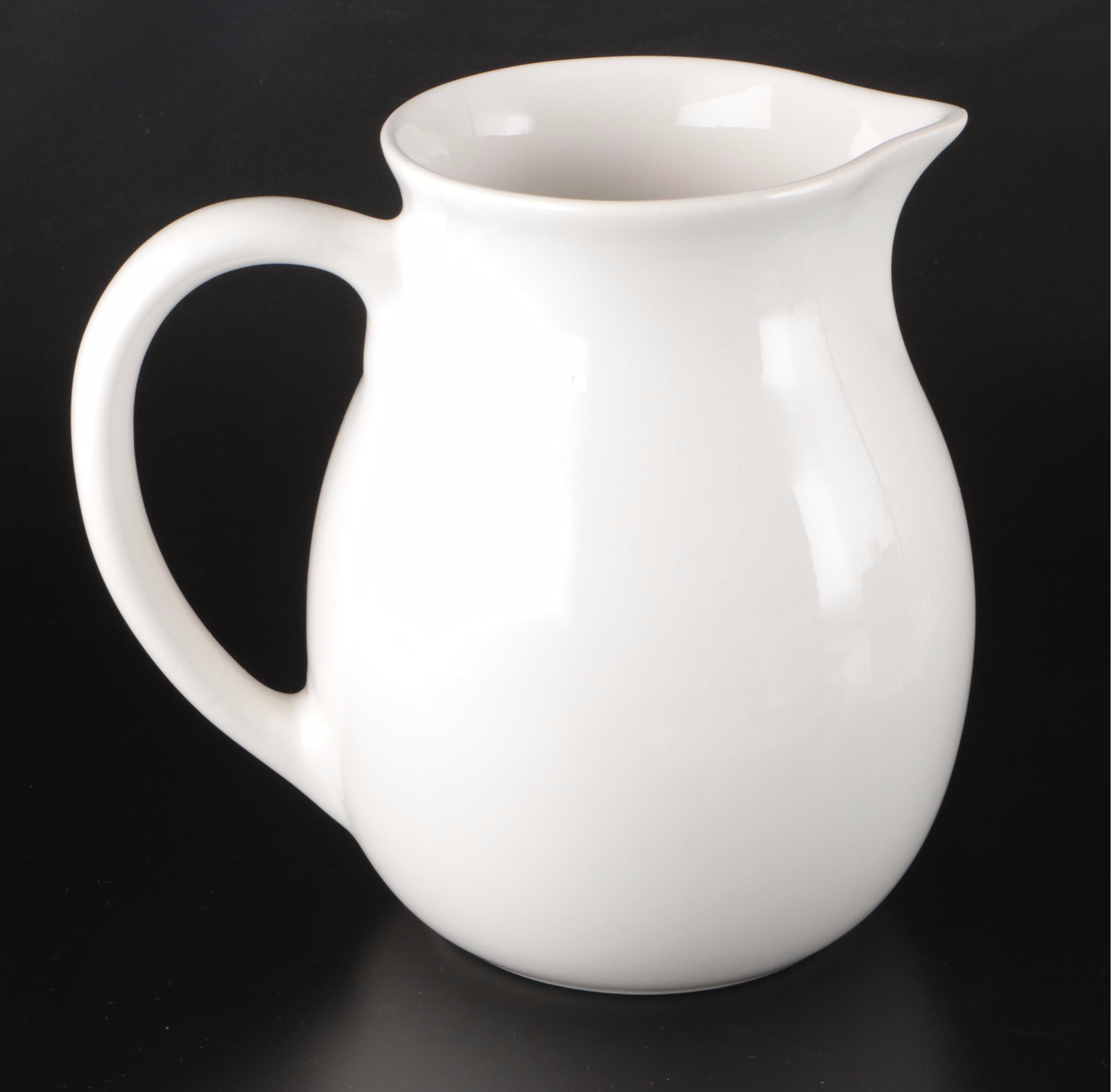 Waterworks Brass Towel Ring, Milk Glass Candle Holders, and More Bathroom Décor