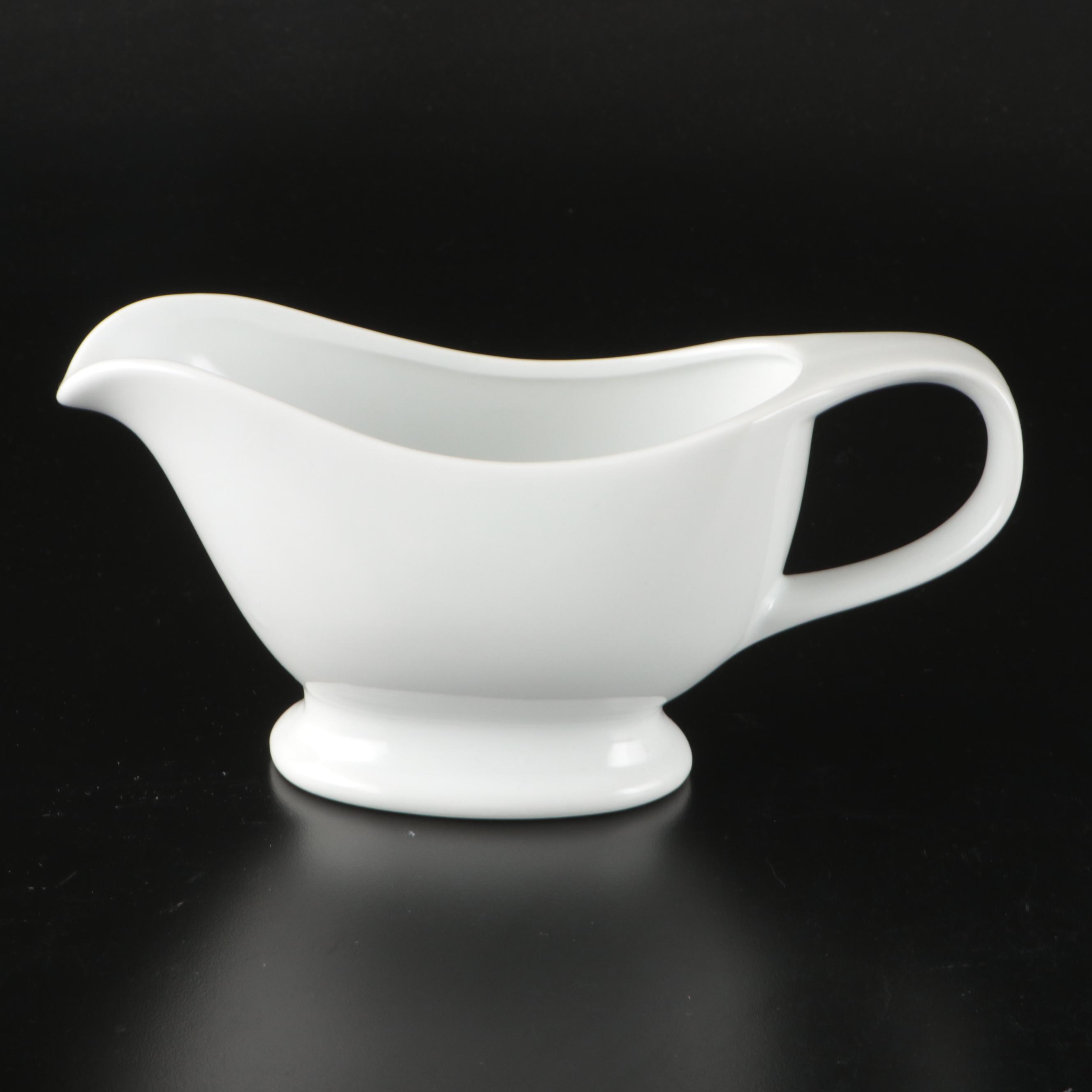 Waterworks Brass Towel Ring, Milk Glass Candle Holders, and More Bathroom Décor